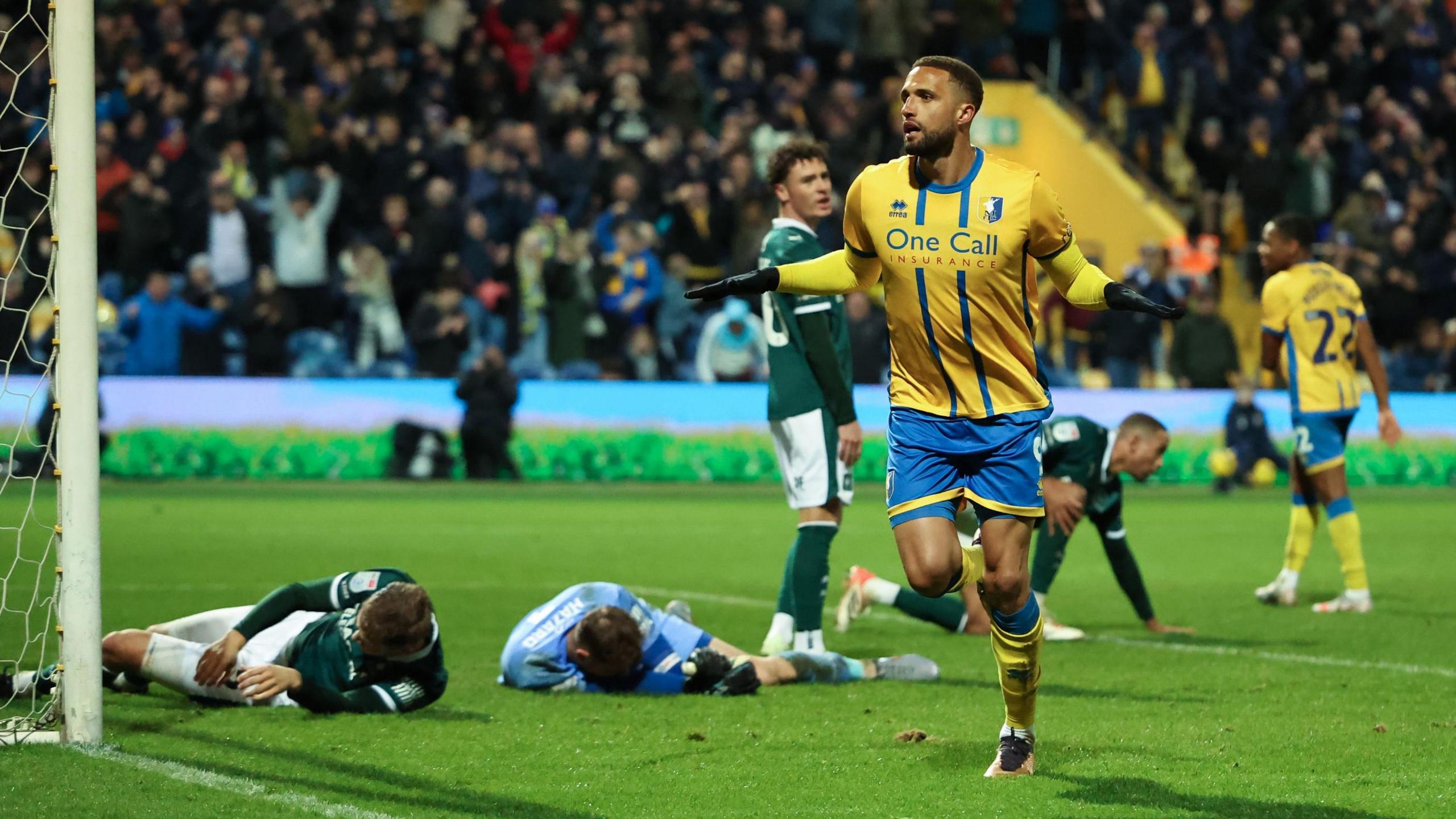 Mansfield defender Jordan Bowery celebrates scoring against Plymouth