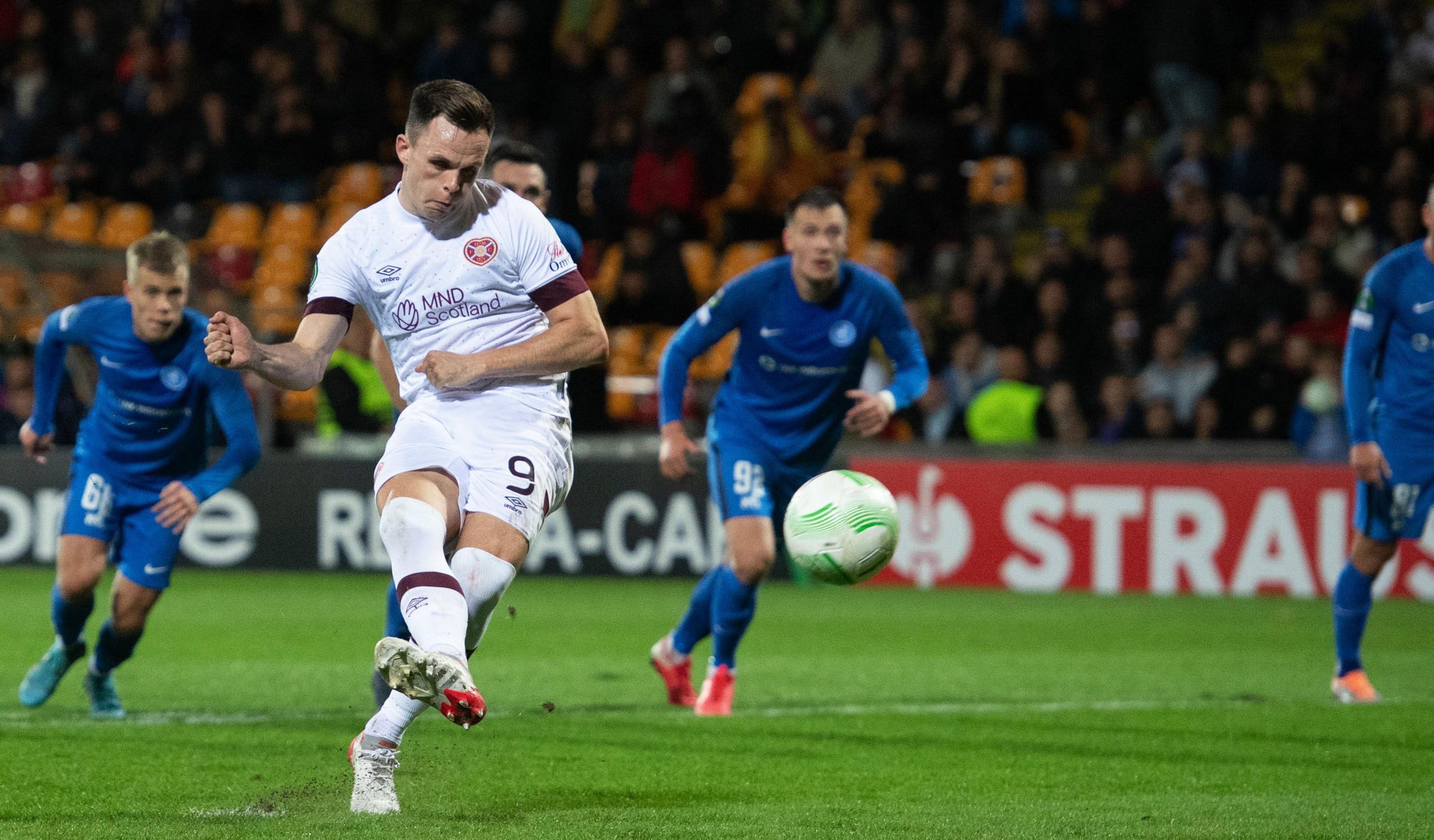 Lawrence Shankland opens the scoring for Hearts against FK RFS in the Europa Conference League in 2022.