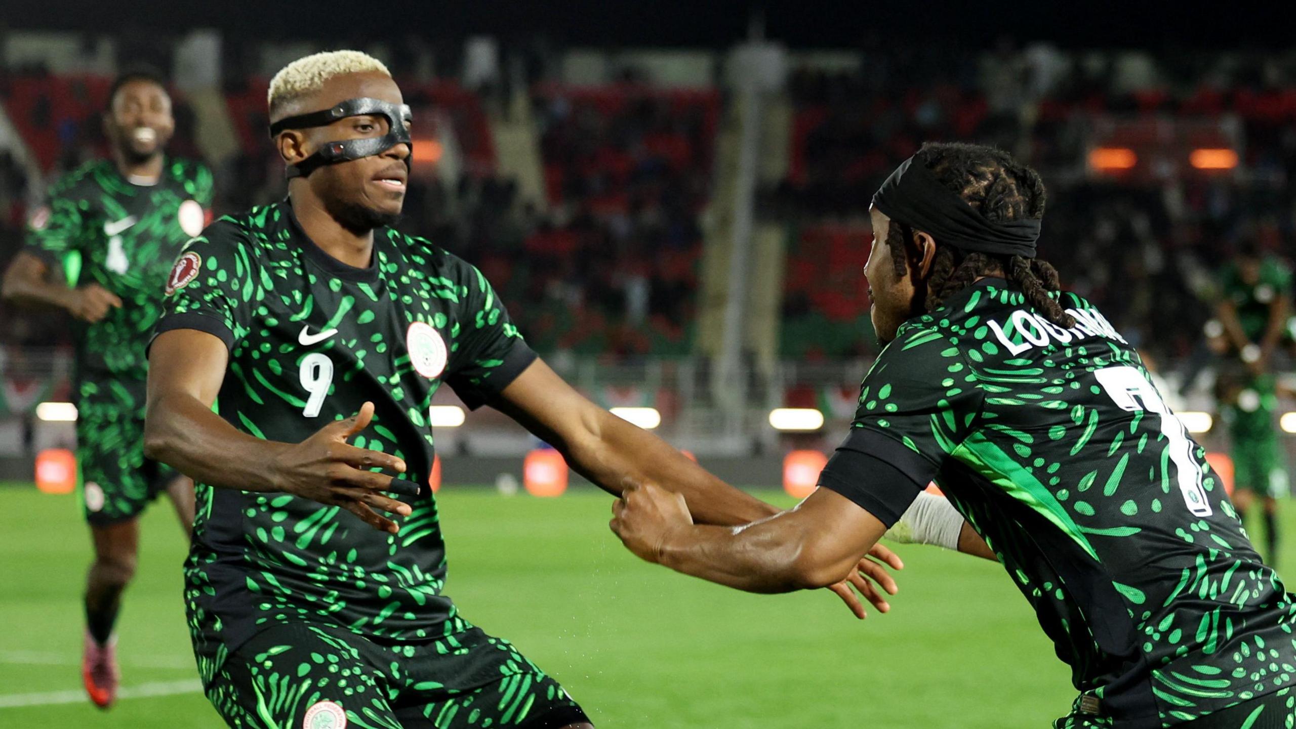 Victor Osimhen celebrates a goal for Nigeria with Ademola Lookman