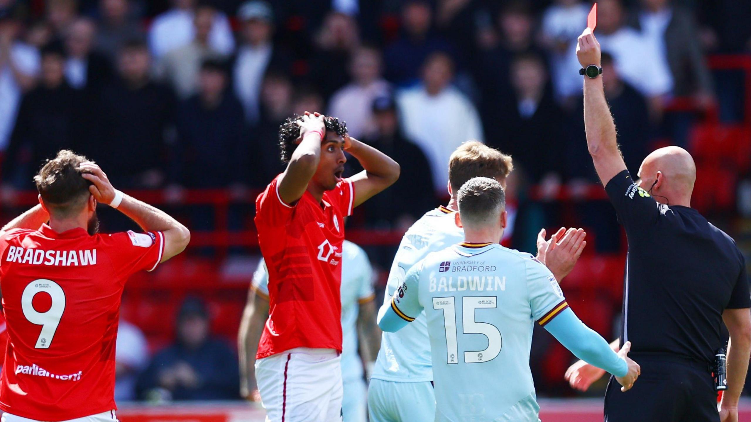 Vimal Yoganathan is sent off at Oakwell