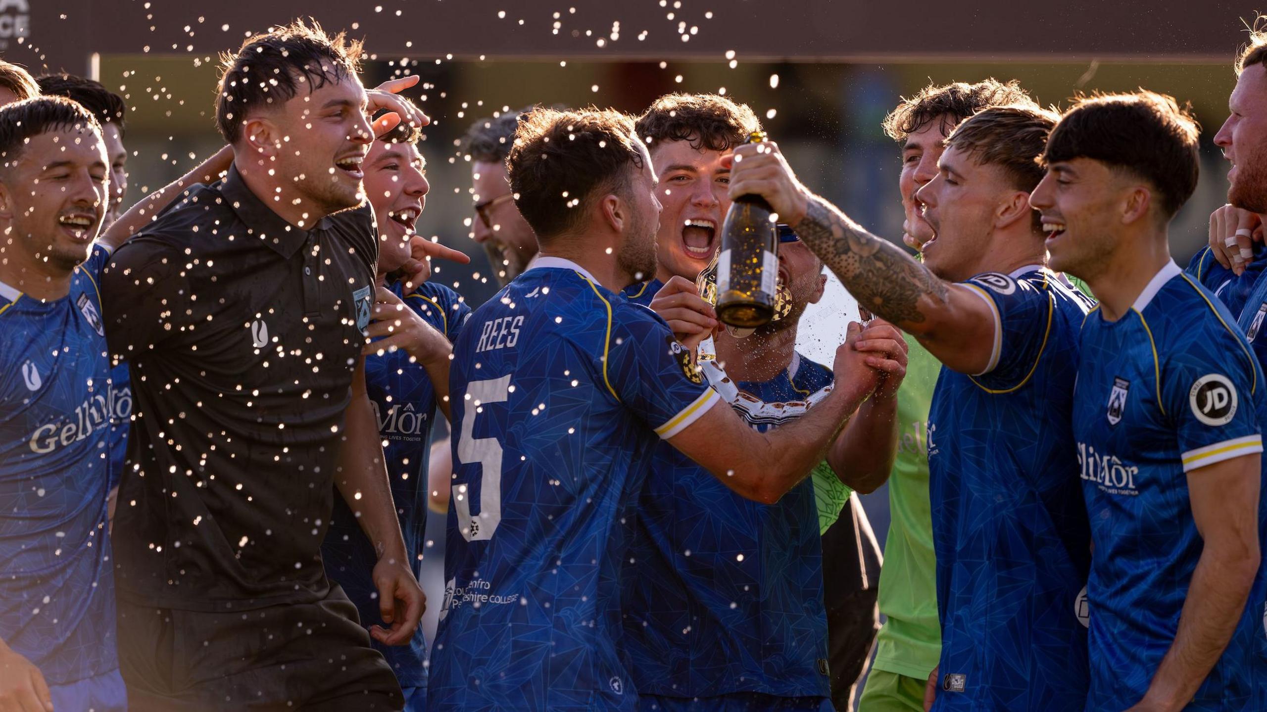 Haverfordwest County celebrate victory in the Cymru Premier European play-off against Caernarfon Town in May
