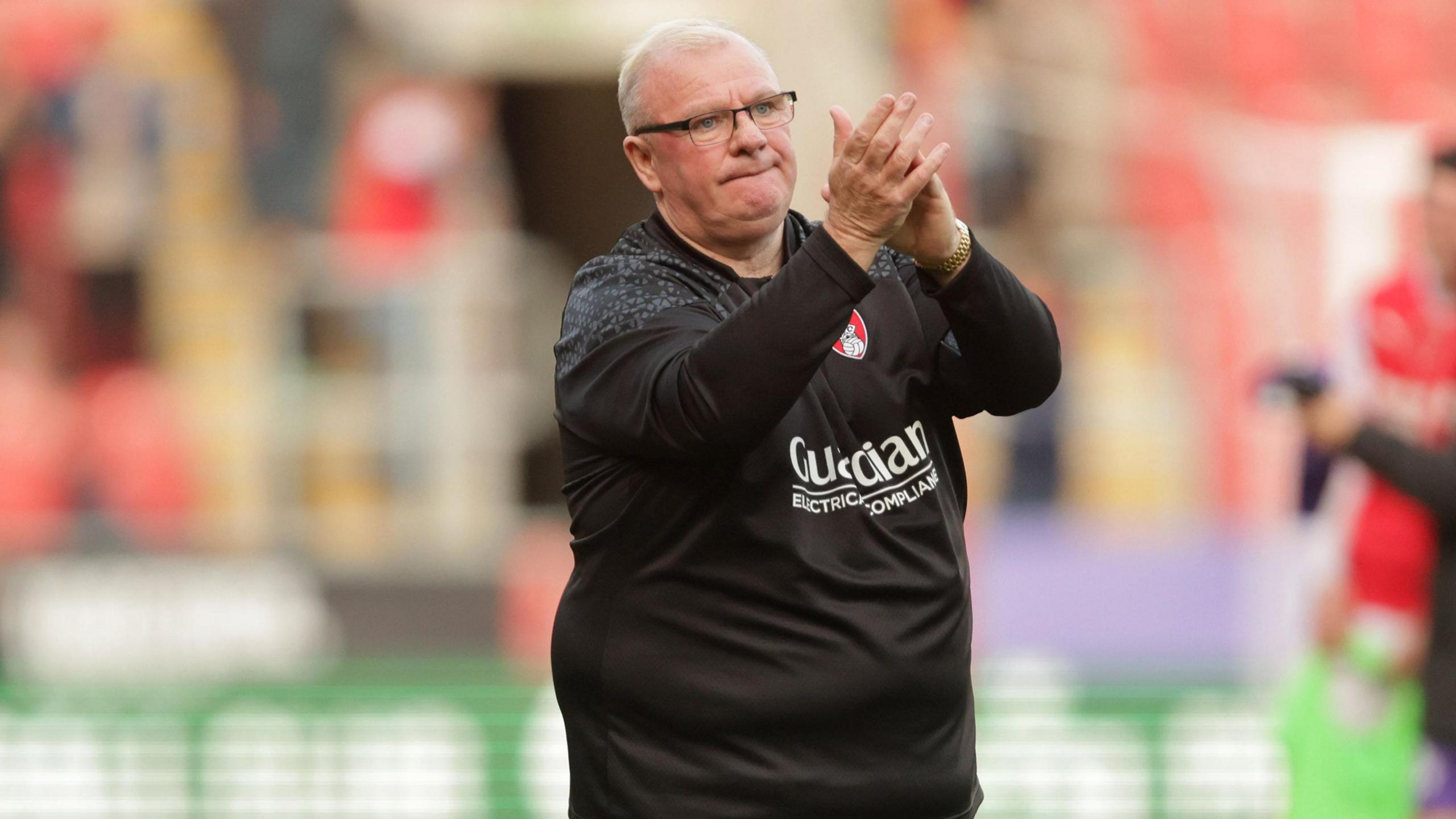 Steve Evans claps Rotherham fans