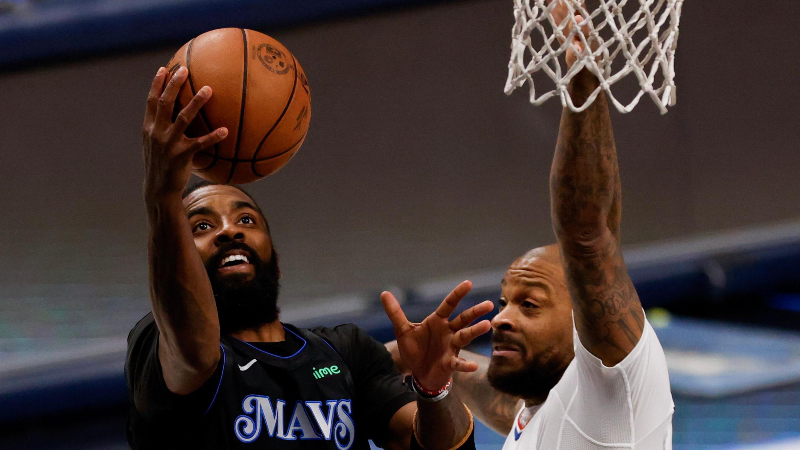 Kyrie Irving (left) in action against the LA Clippers