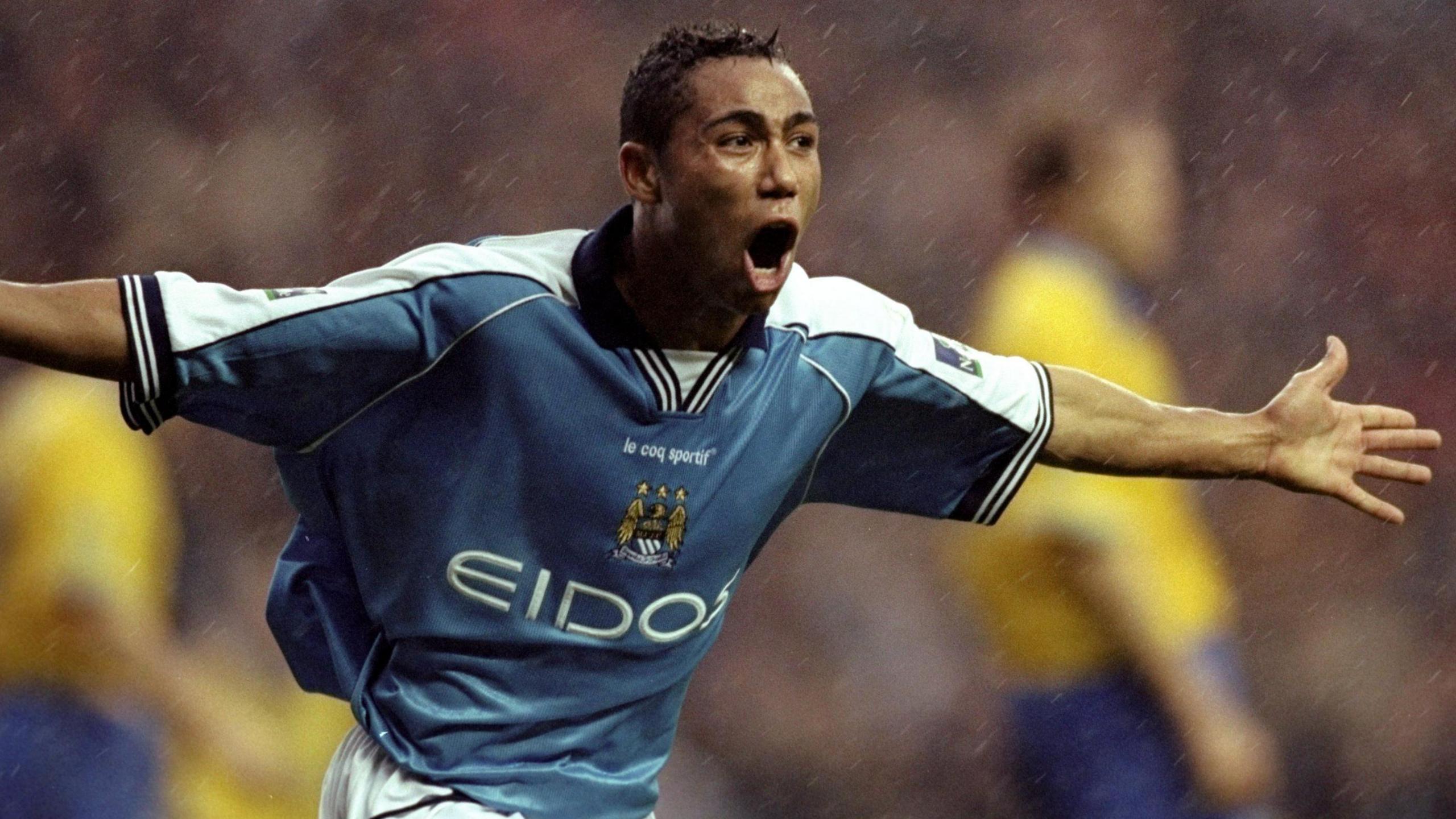 Jeff Whitley celebrates a goal for Manchester City