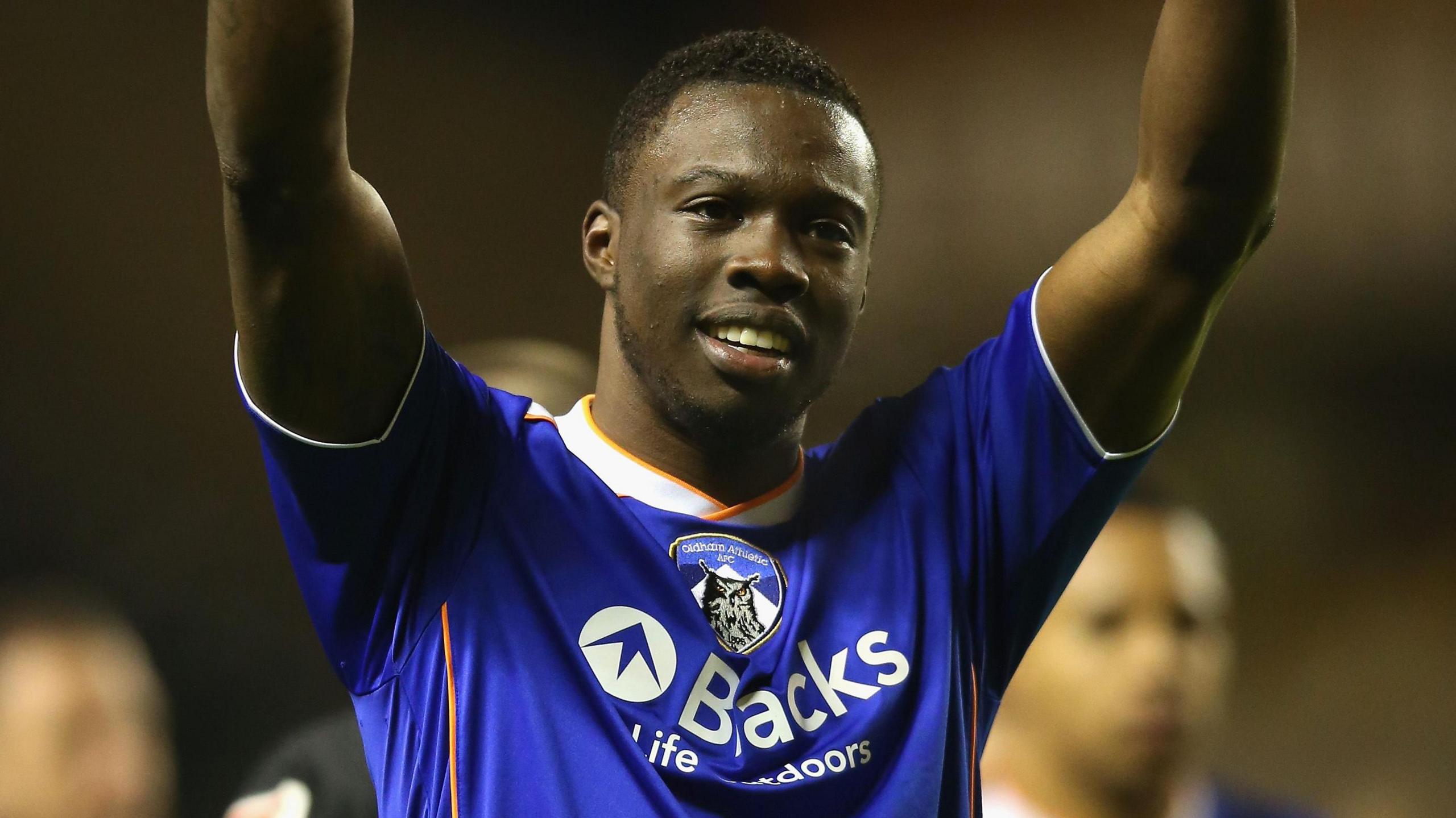 Genseric Kusunga celebrates while playing for Oldham