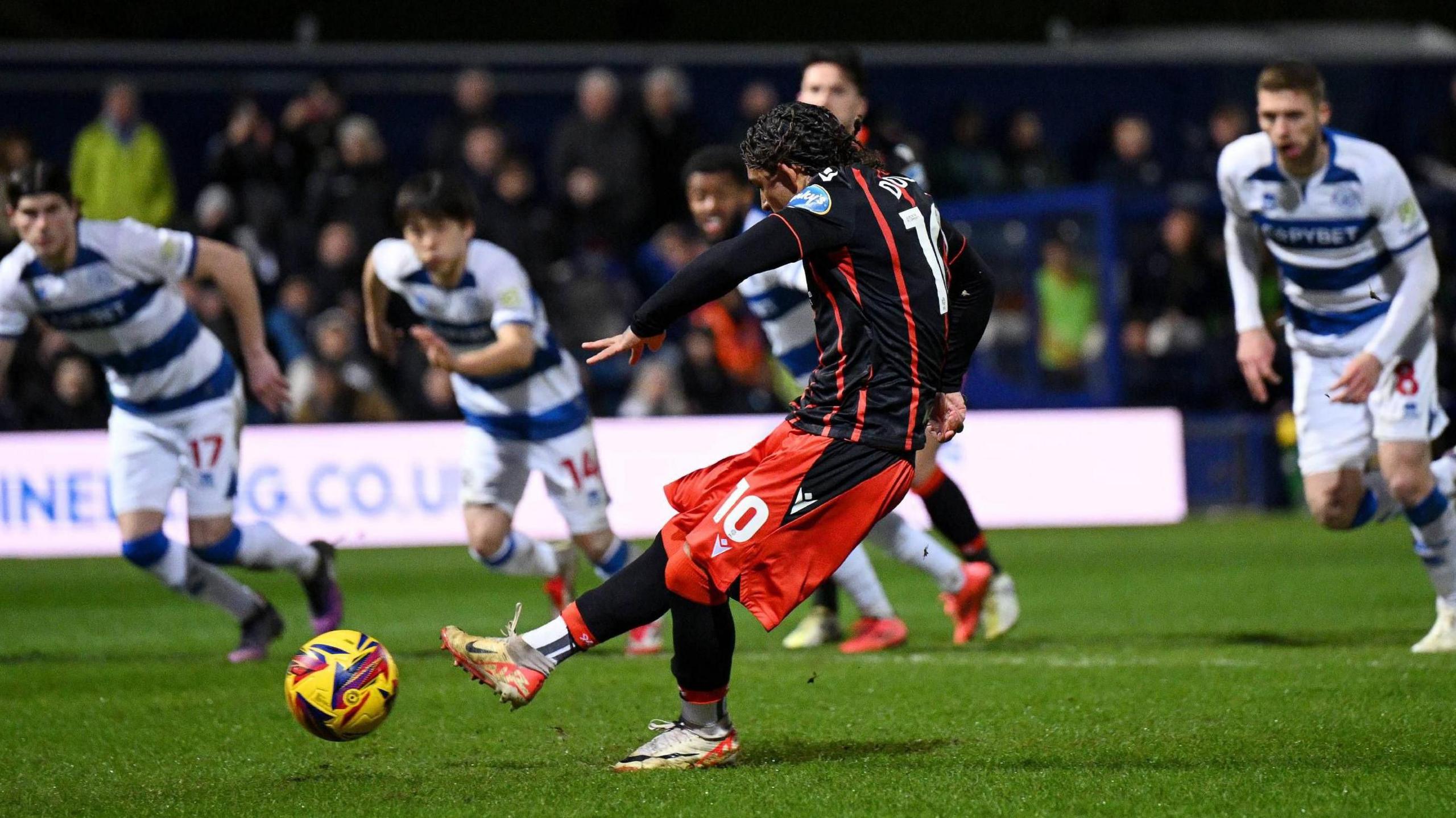 Tyrhys Dolan scores a penalty for Blackburn Rovers against Queens Park Rangers