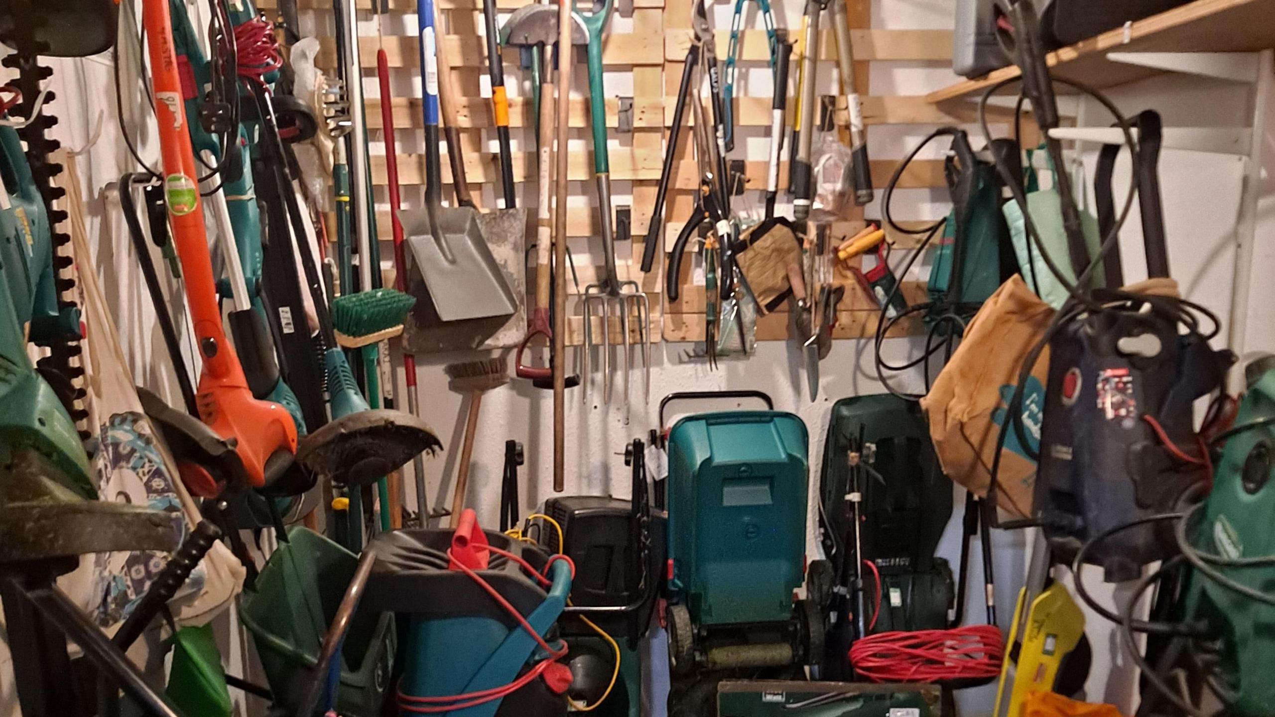 Tools and equipment hanging on a wall