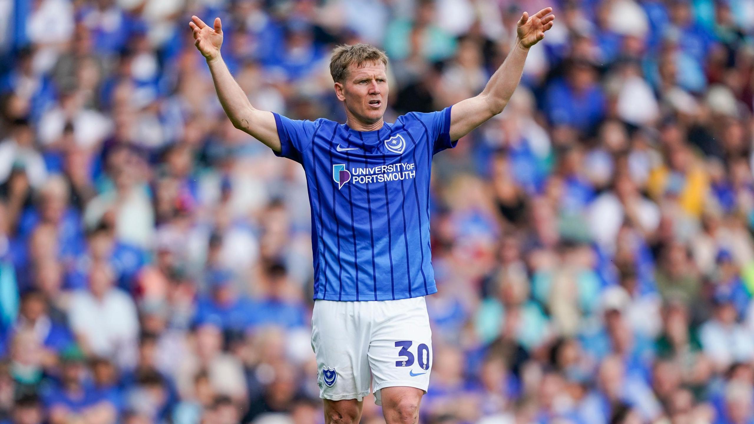 Matt Ritchie with his hands in the air