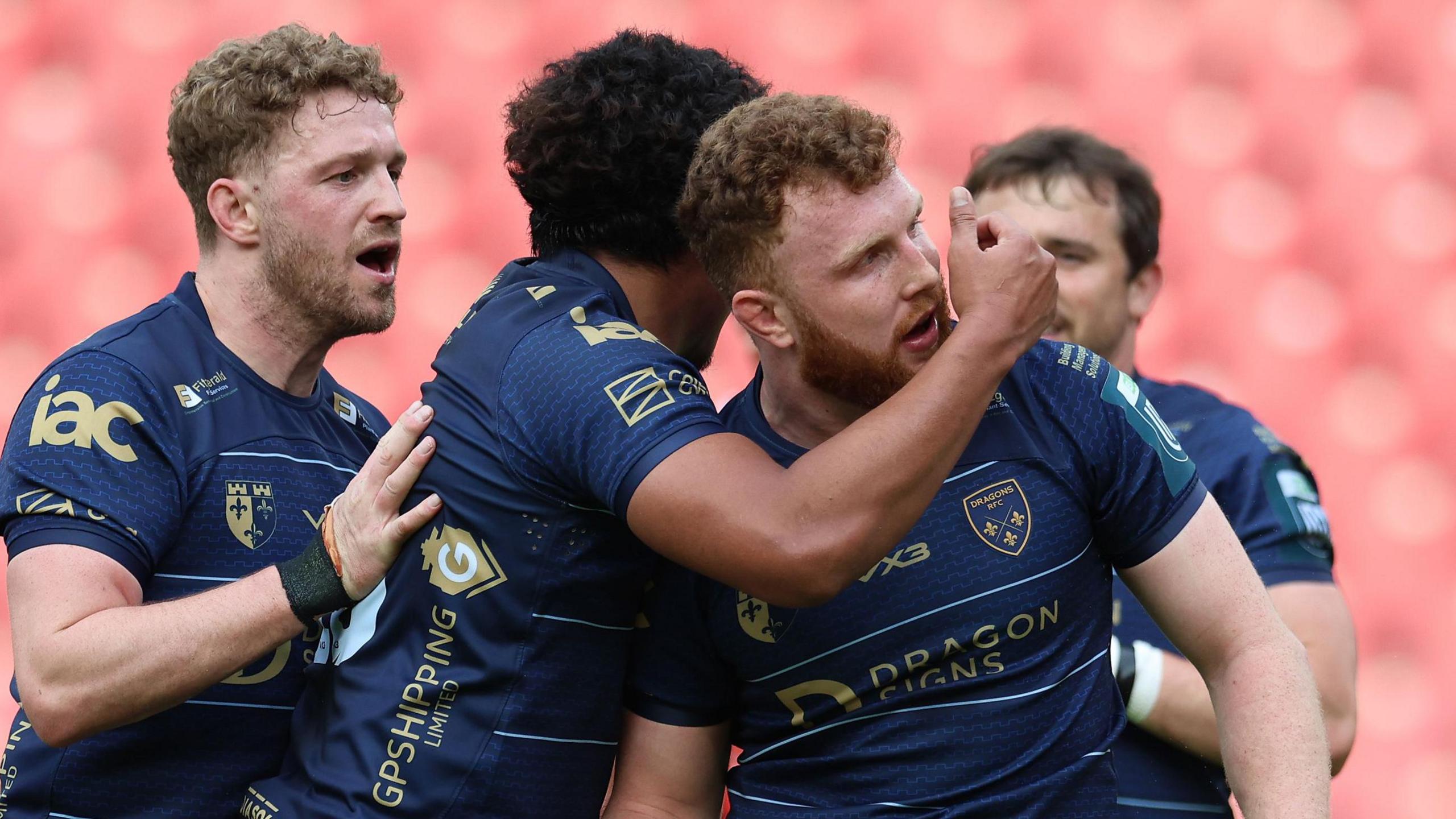 Aneurin Owen celebrates after scoring at Lions