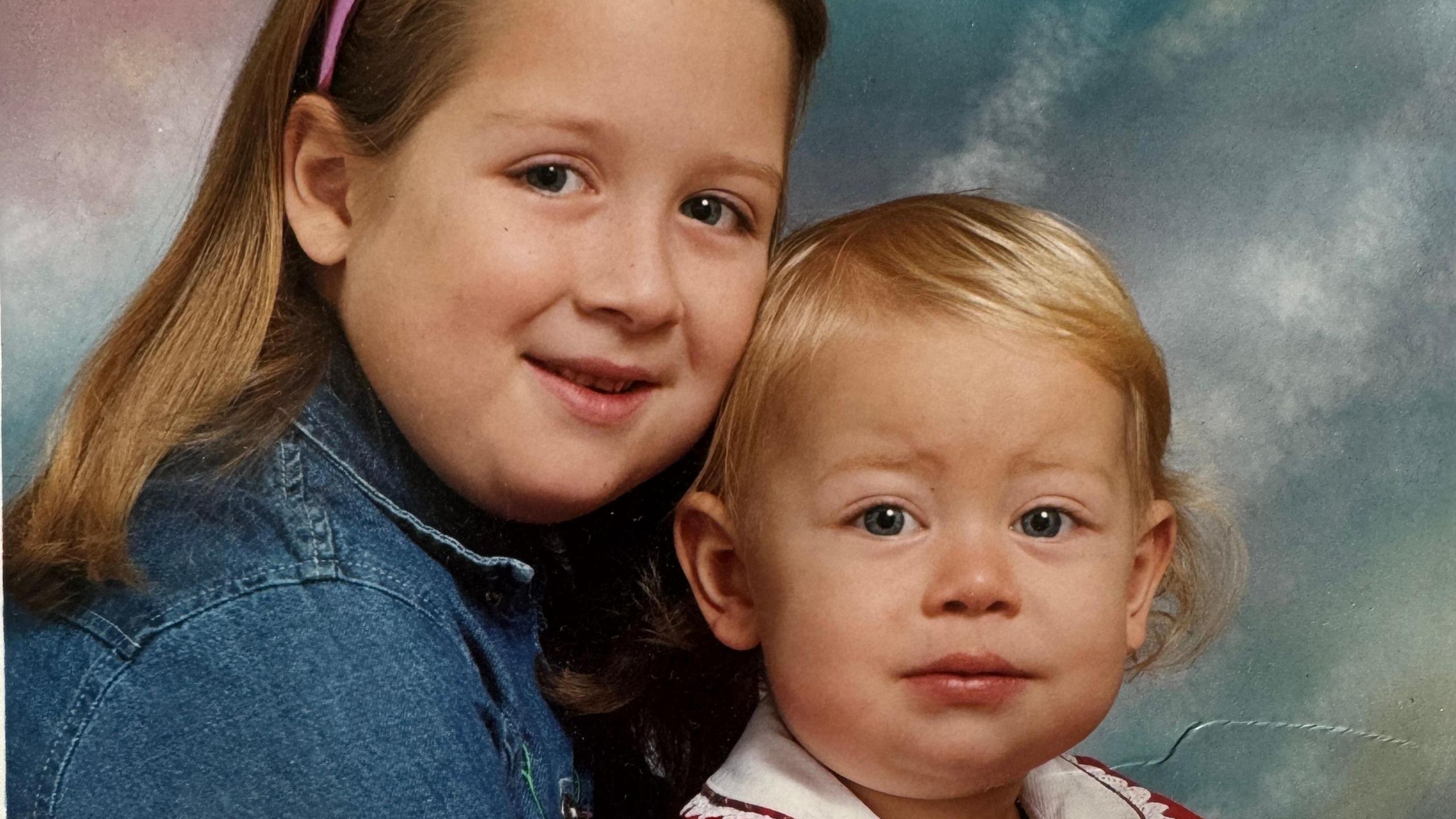 Family photo showing two sisters together as children