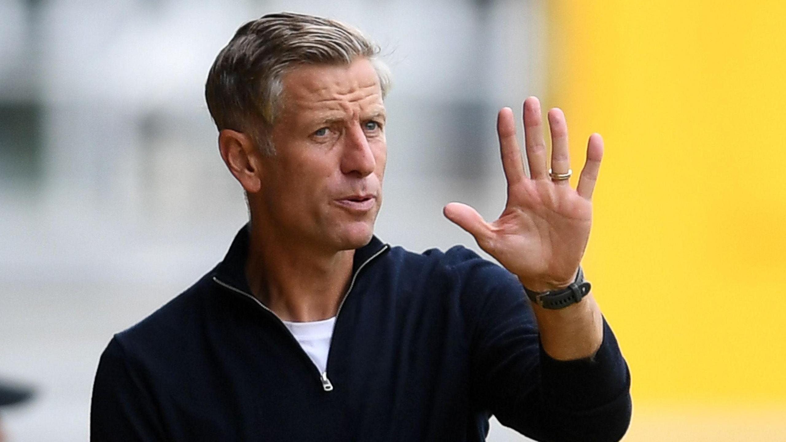 Newport County manager David Hughes gives orders from the touchline
