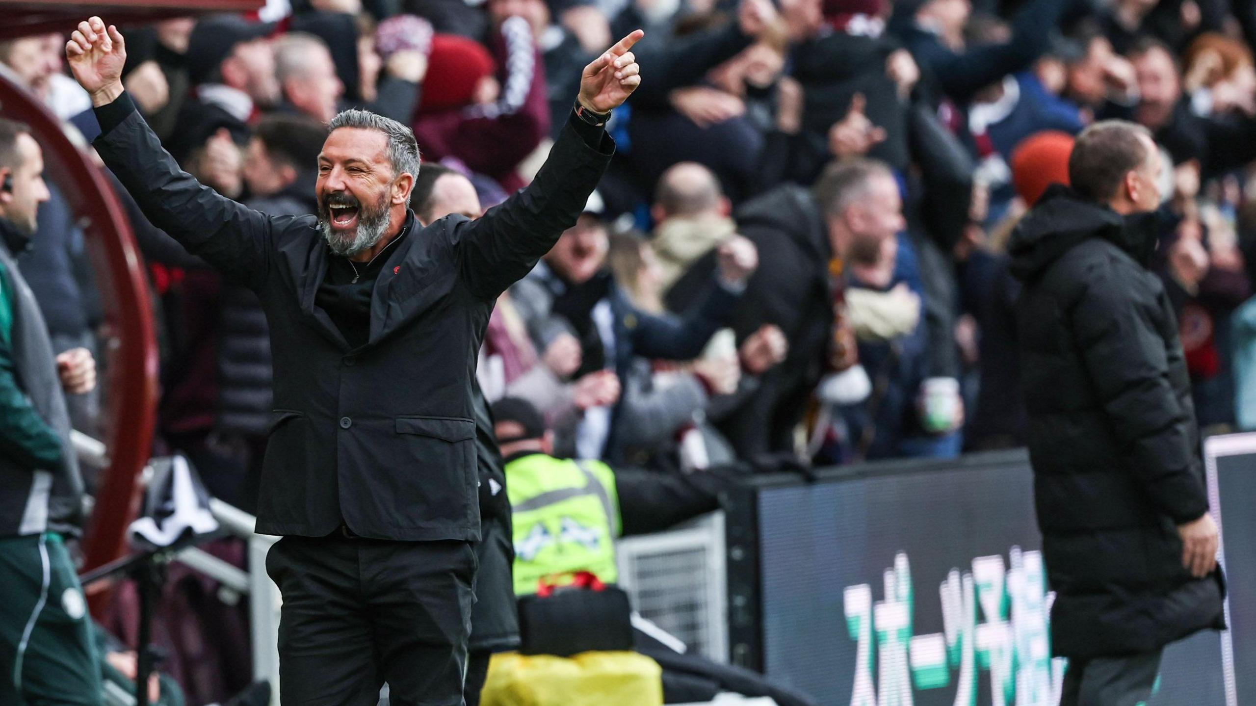 Hearts head coach Derek McInnes celebrates against Celtic