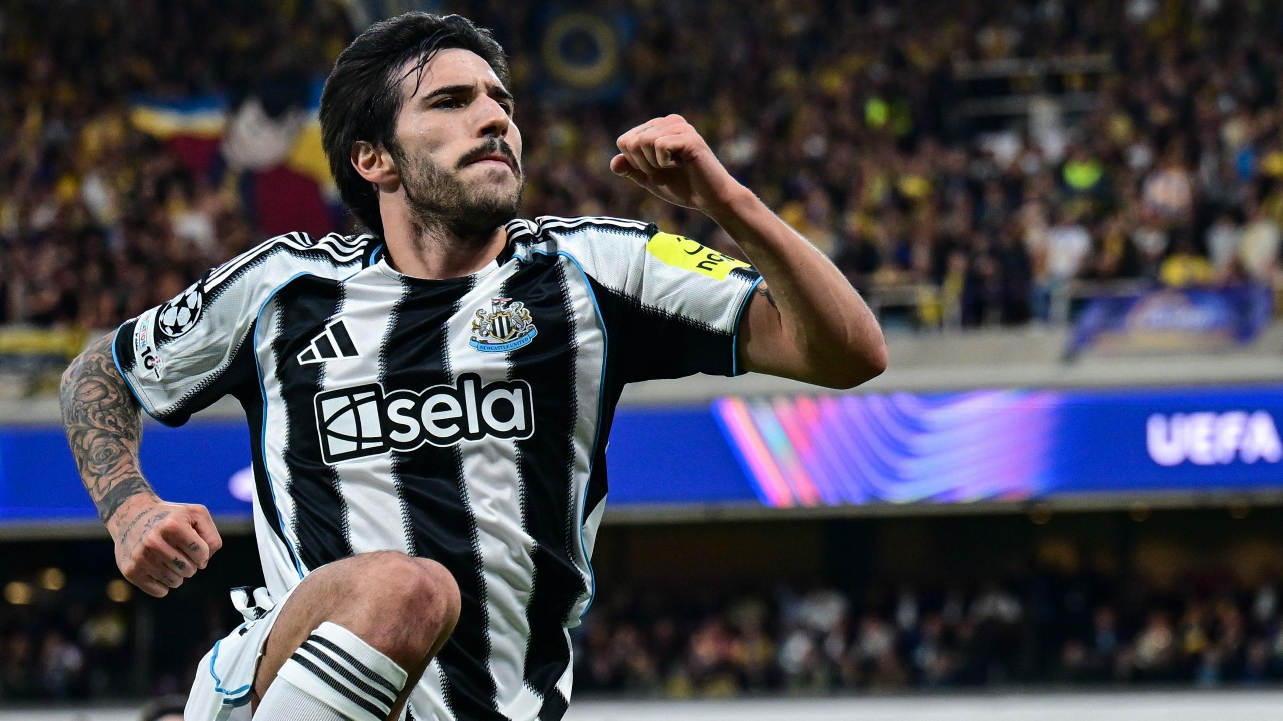 Sandro Tonali jumping in the air to celebrate scoring a goal for Newcastle