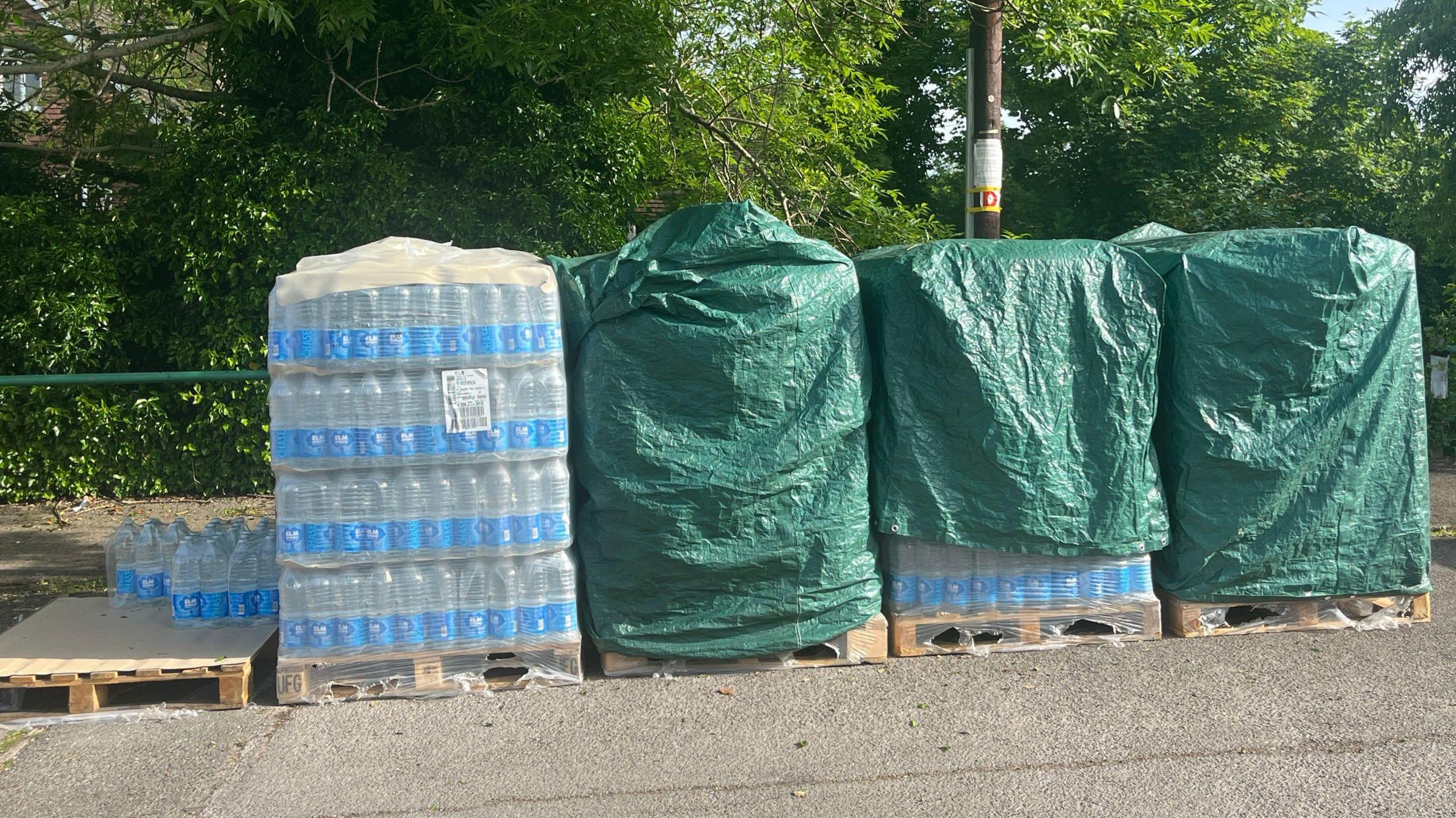 Water bottles waiting to be distributed in Bramley