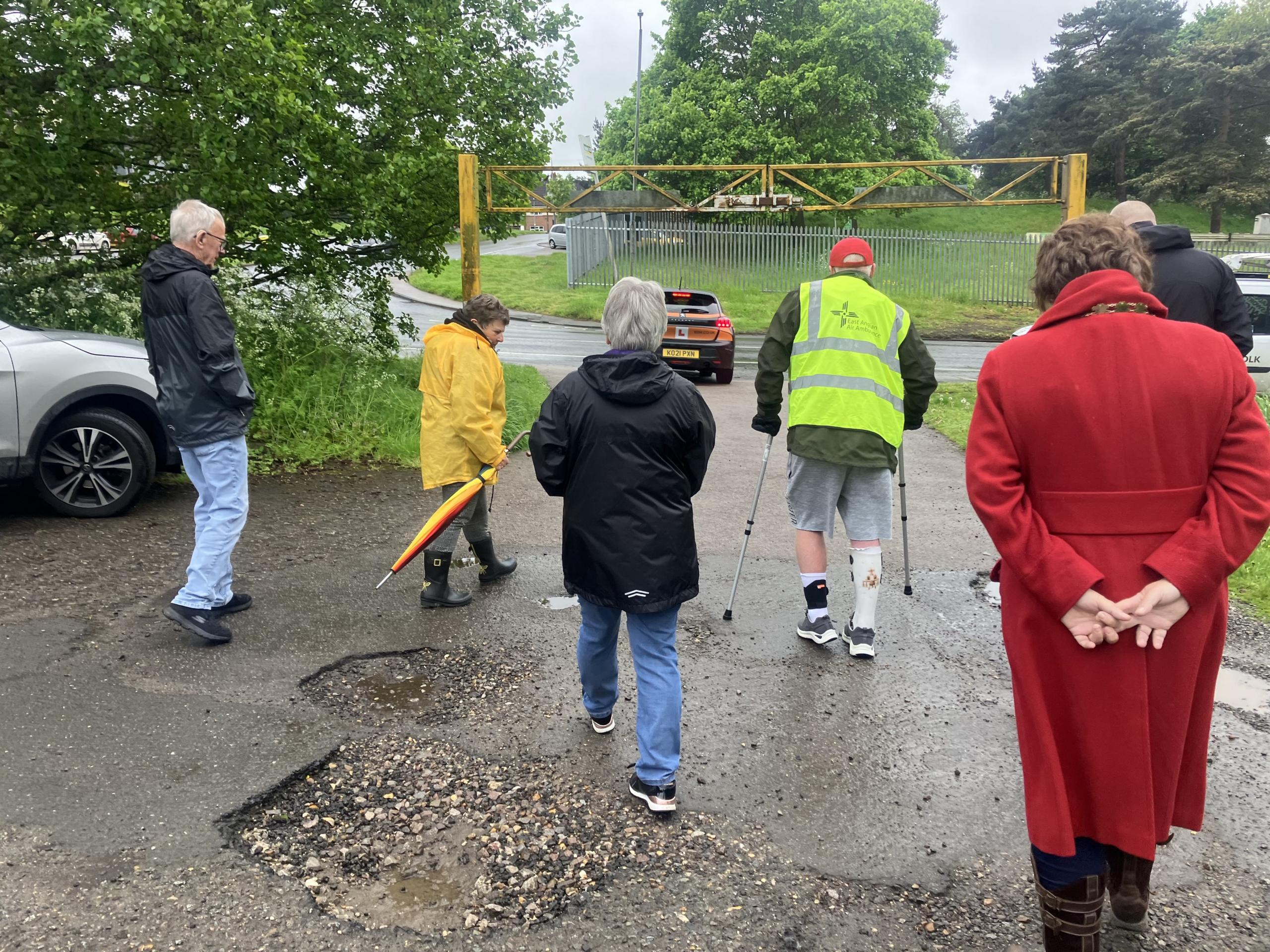 Andy walking with supporters