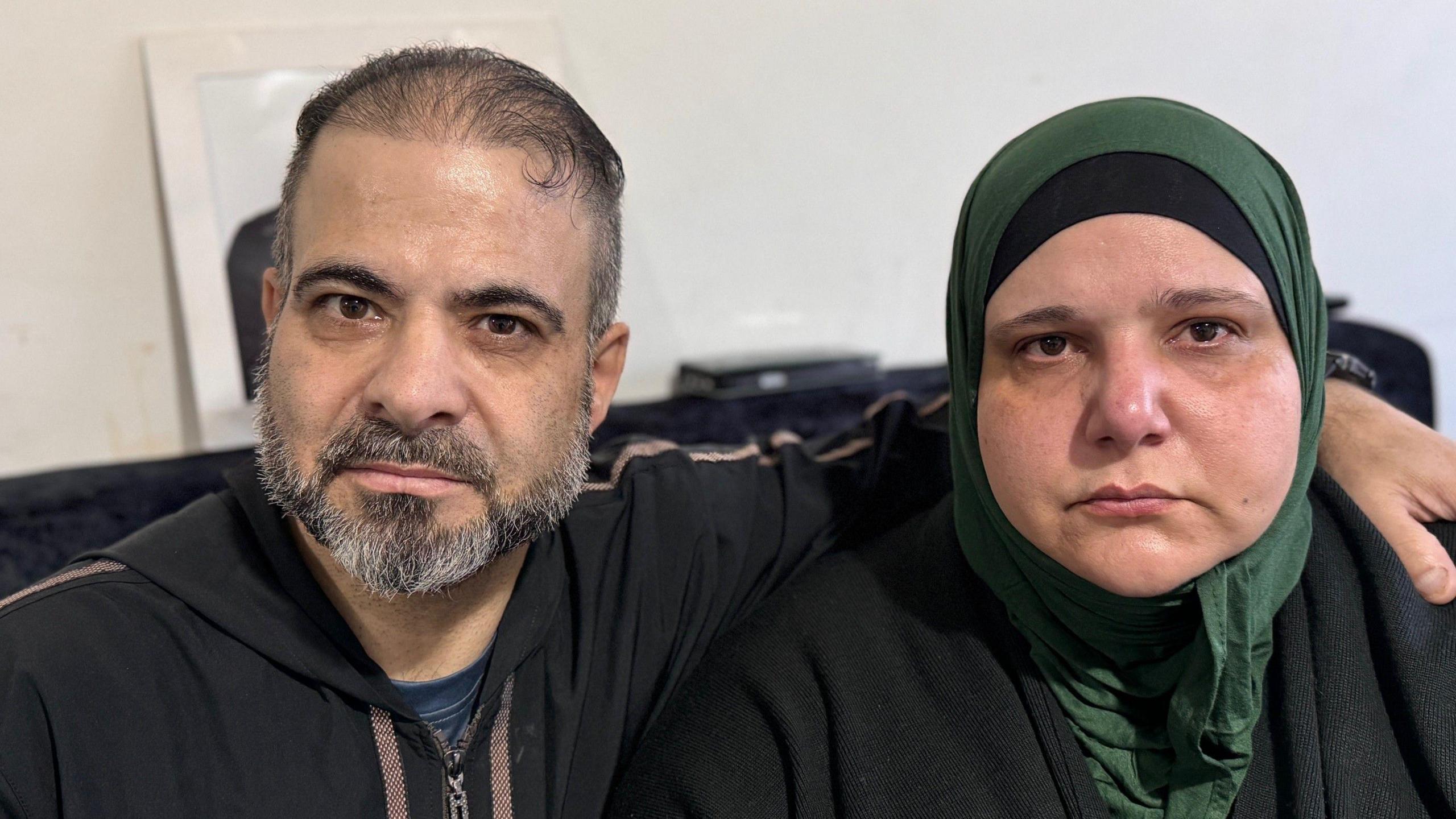 A photo of Noufel and Arwaassi Asmael, who is wearing a headscarf