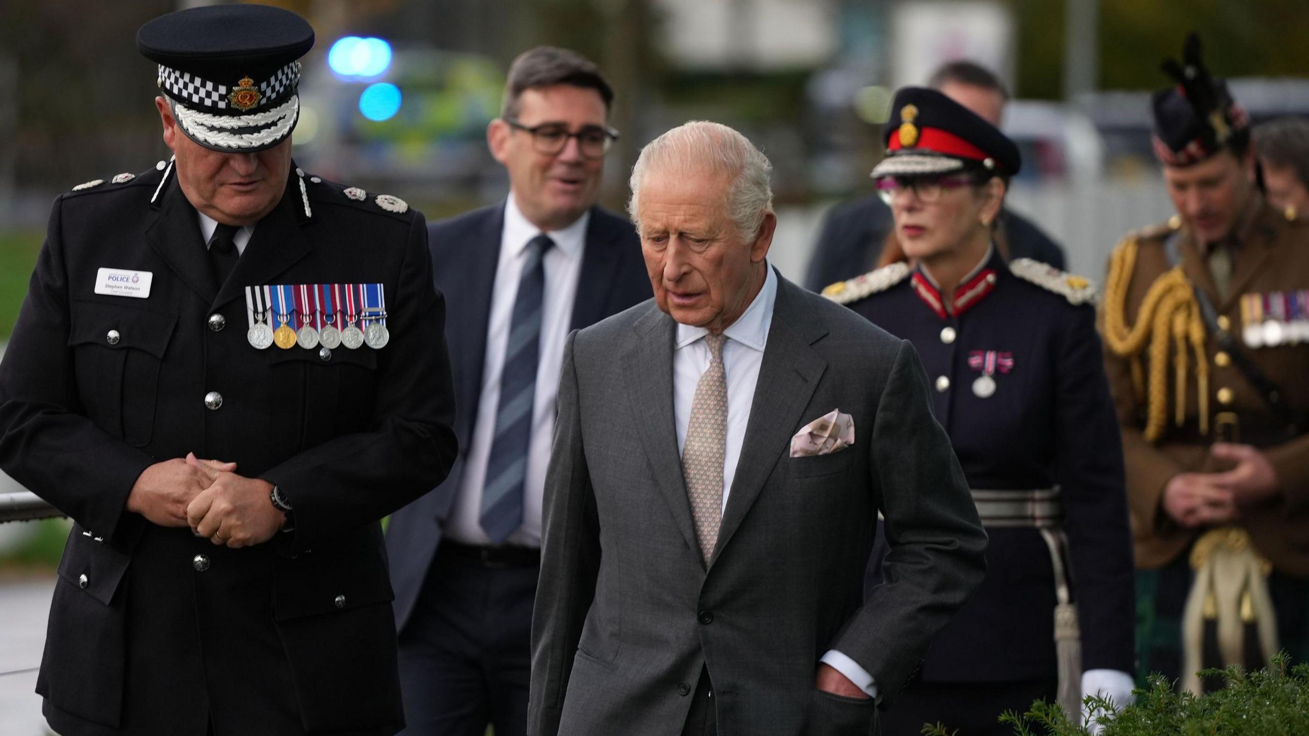 The King (right) meeting Greater Manchester Police Chief Constable Stephen Watson (left) and Greater Manchester mayor Andy Burnham (back centre) 