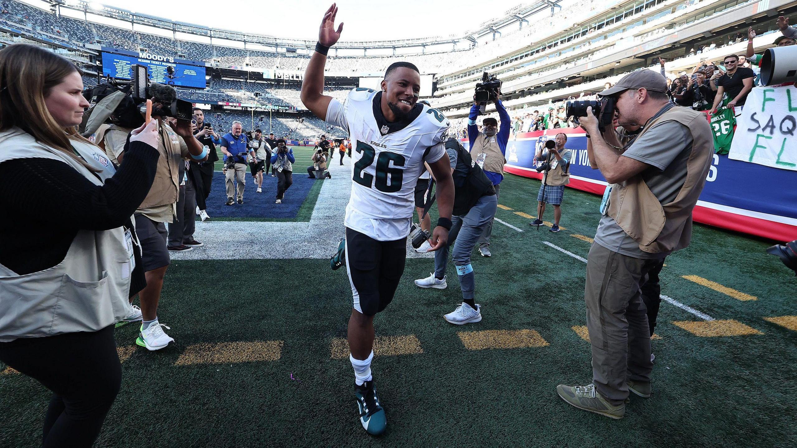 Saquon Barkley runs off the field after the Philadelphia Eagles beat the New York Giants