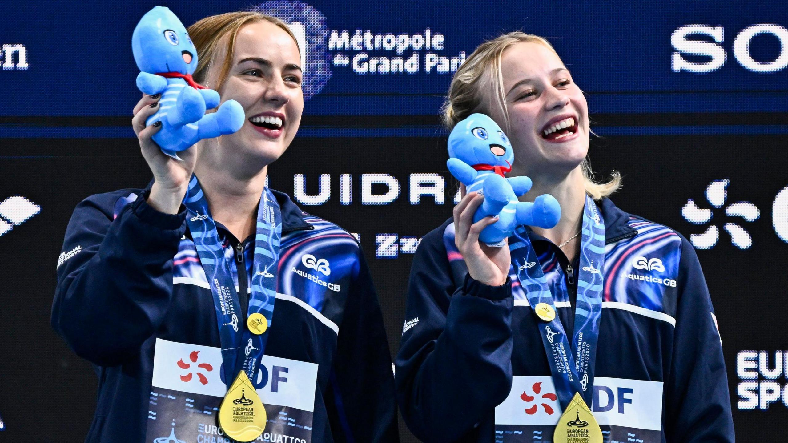Lois Toulson and Maisie Bond celebrate winning gold 