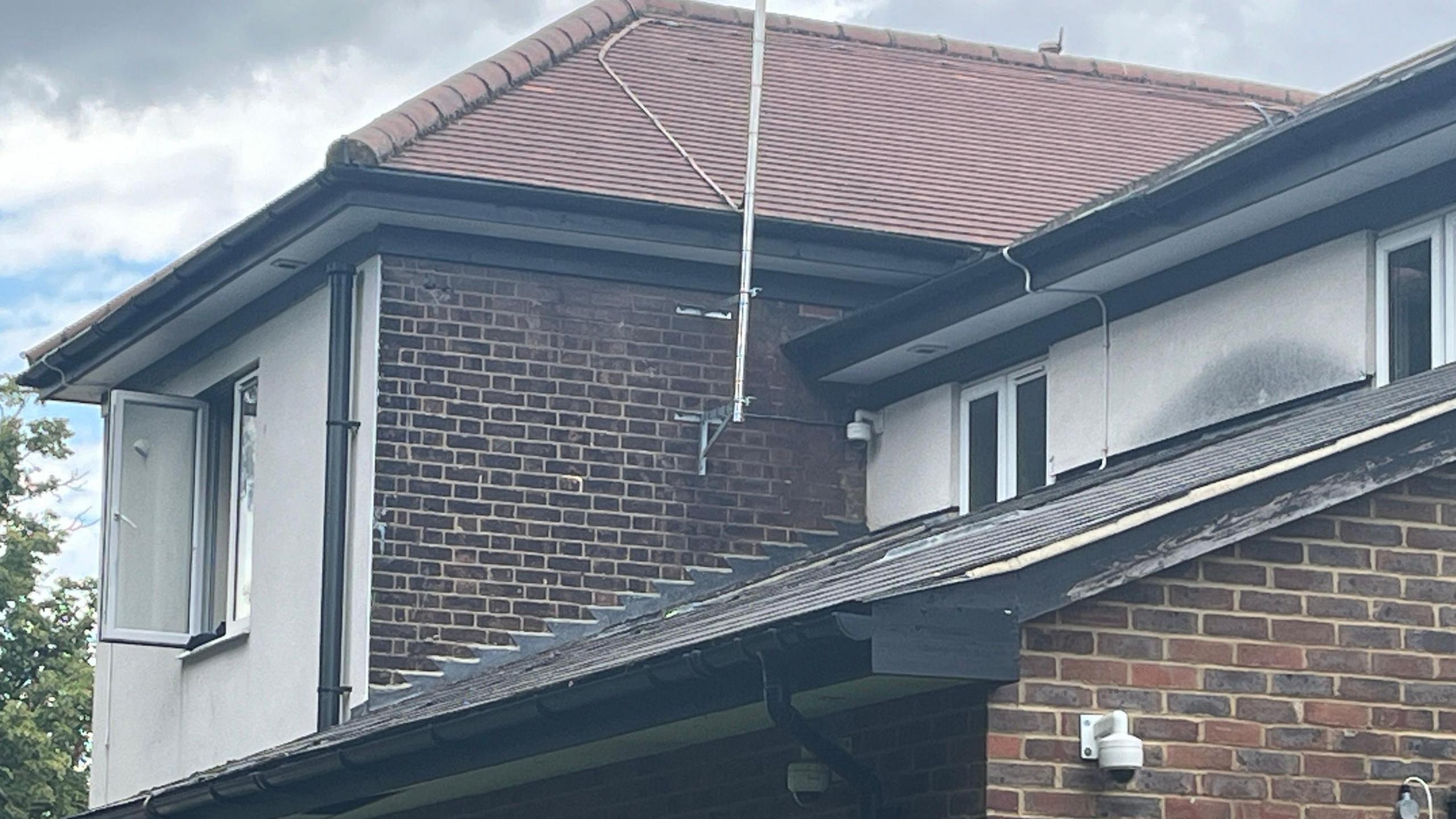 Close up of smoke discolouration on the exterior of a building in Luton