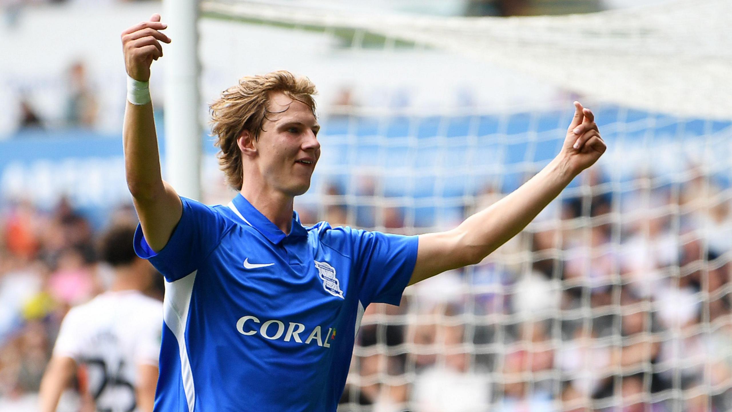 August Priske celebrates