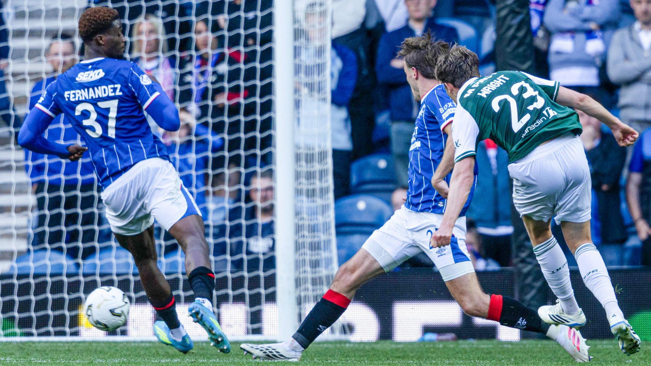 Hibs' Callum Wright (right) scores at Ibrox