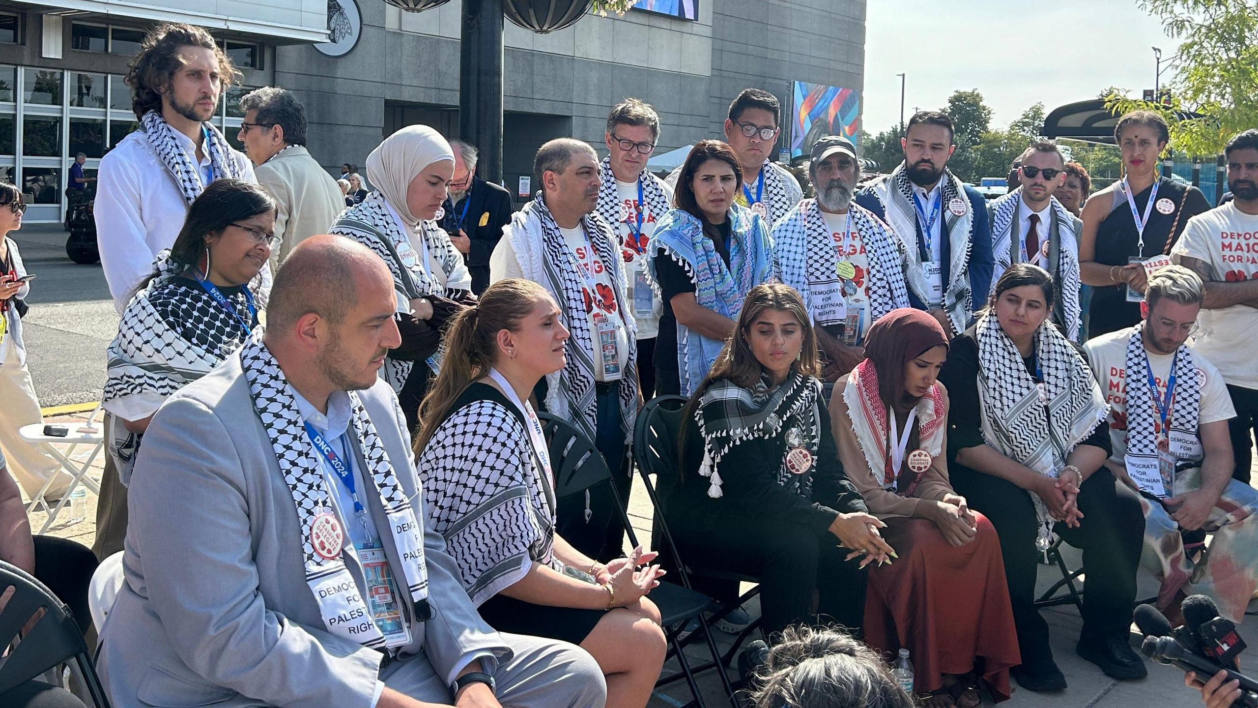 Uncommitted delegates protest outside the arena