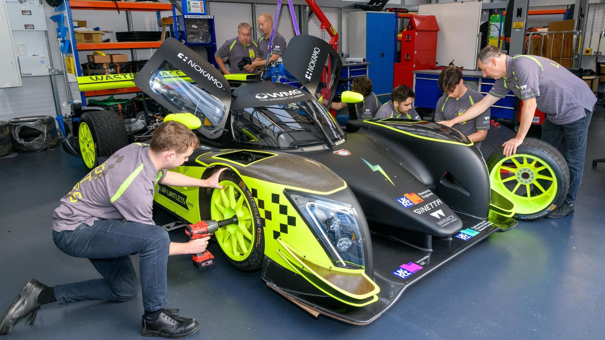 Engineers from the Warwick Manufacturing Group working on a hydrogen-powered car.