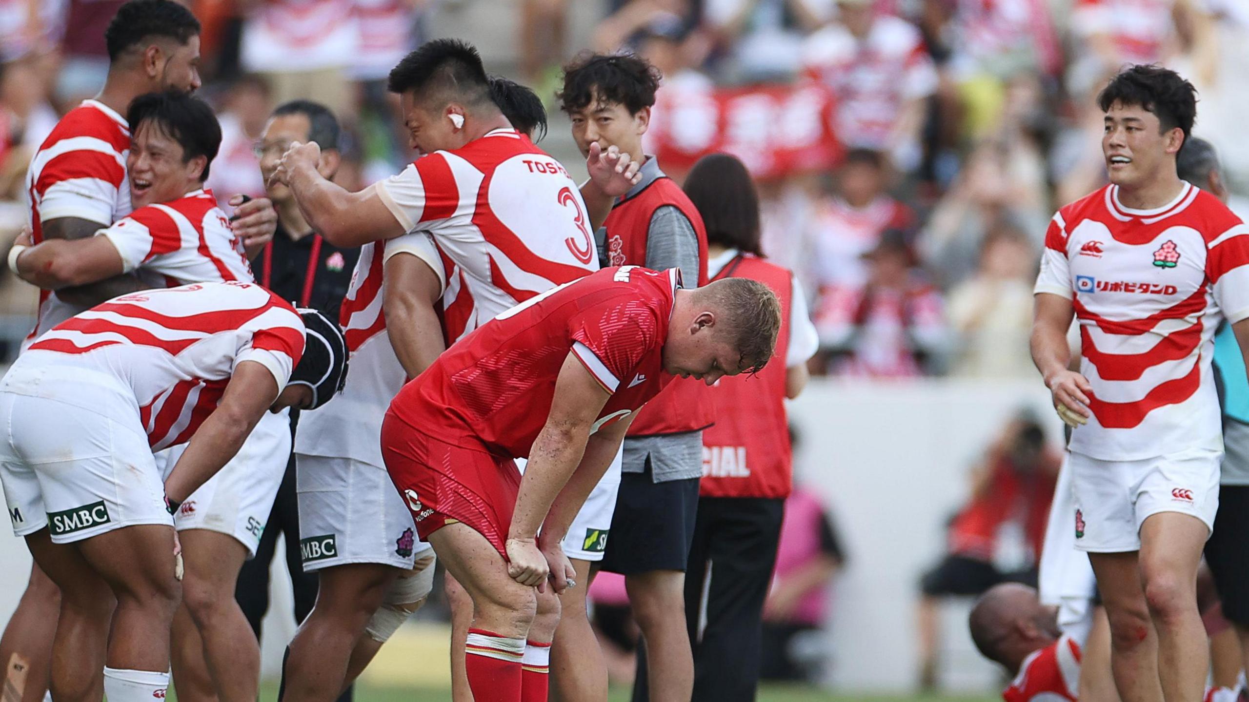 Wales fly-half Sam Costelow in despair as Japan celebrate