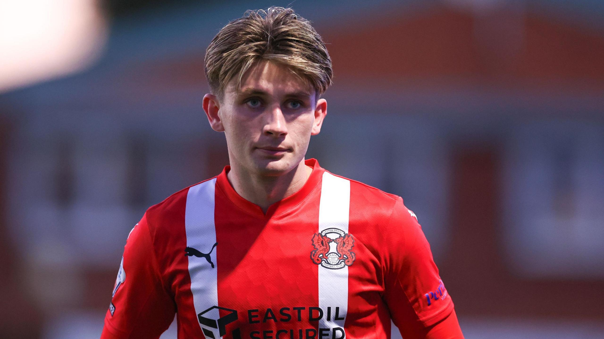 Ollie O'Neill standing on the pitch during a match for Leyton Orient