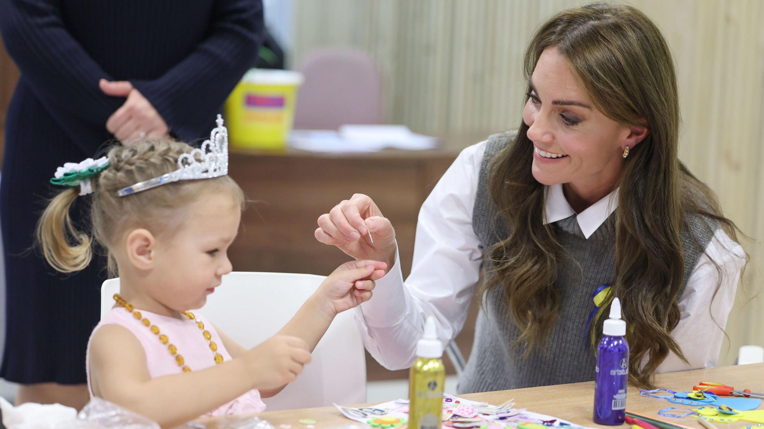 Catherine with a child 