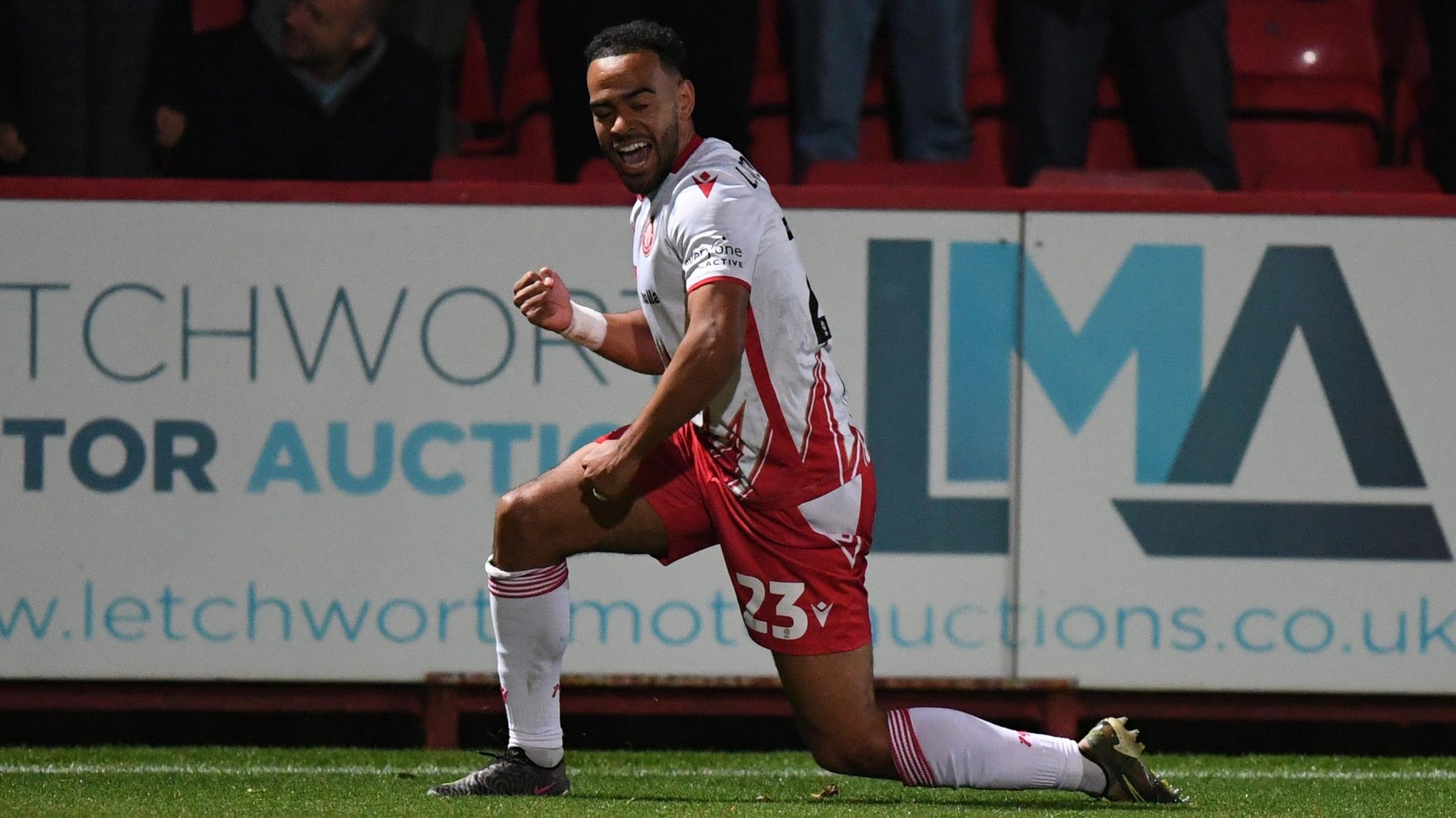 Stevenage's central midfielder Louis Thompson celebrates scoring against Wrexham