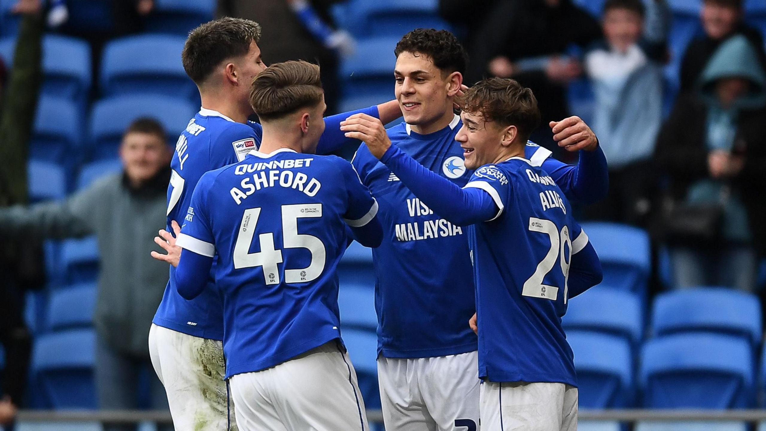 Yousef Salech celebrates his goal with Cardiff team mates