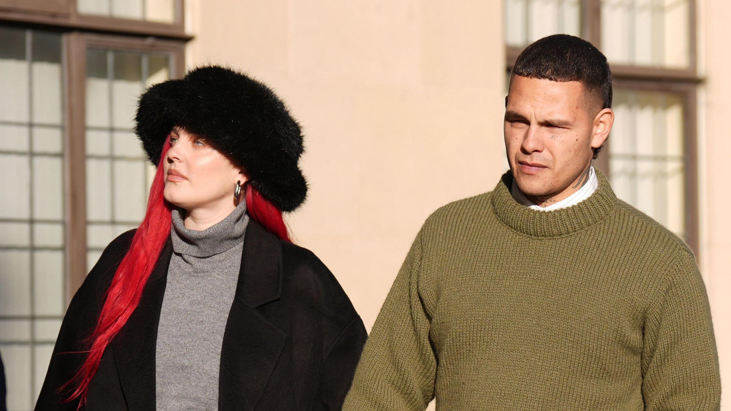 Tyron Frampton, known by the stage name Slowthai, arriving at Oxford Crown Court, where he is accused of two charges of rape. Alongside him is his wife Anne-Marie