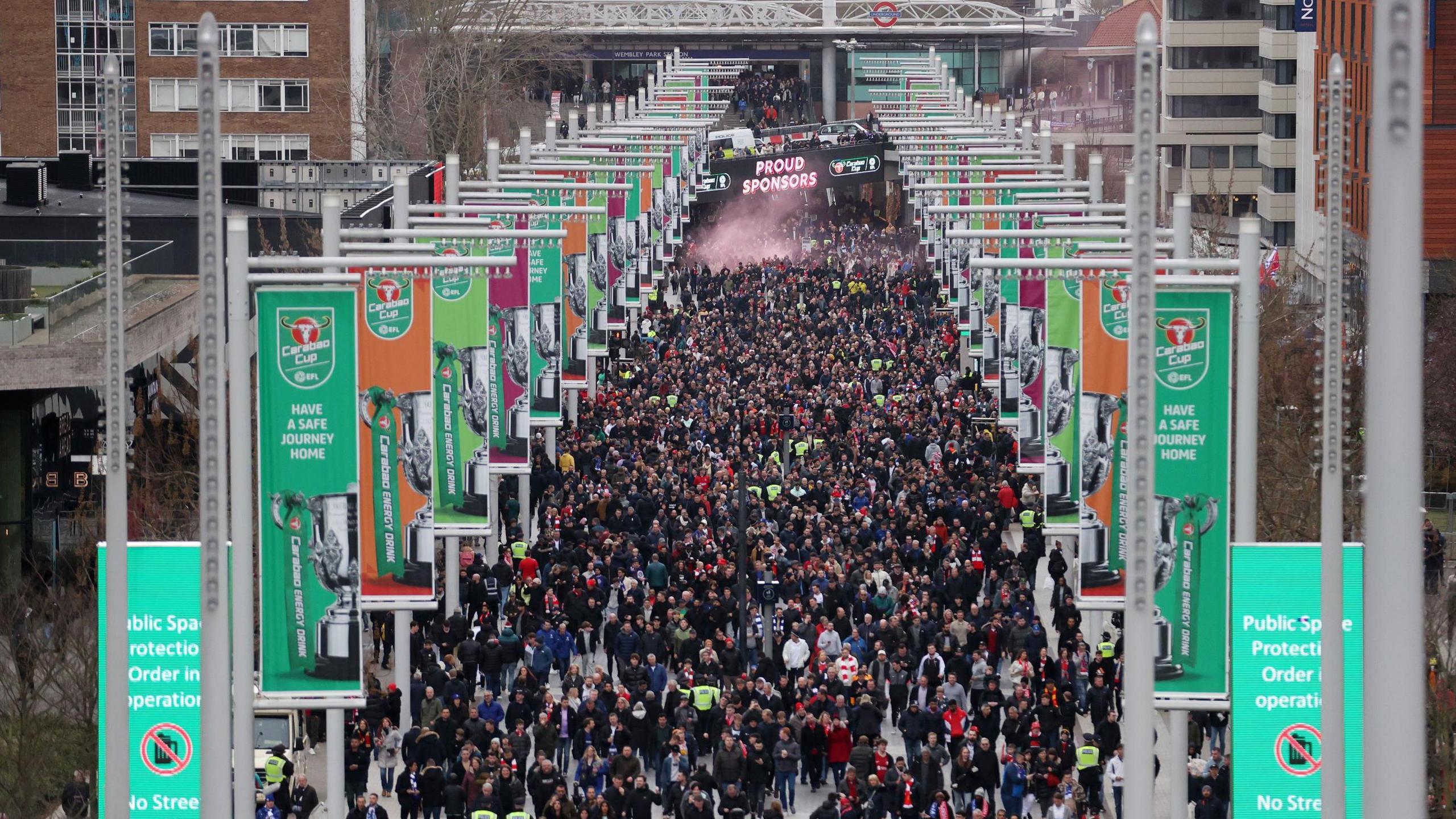 Fans walking towards Wembley Stadium for the Carabao Cup Final 2024.