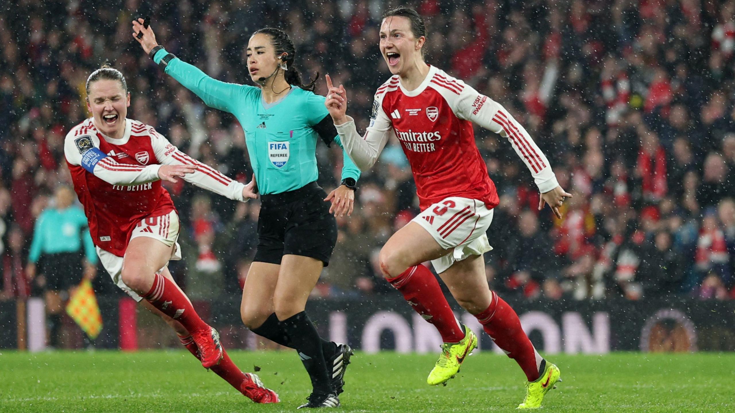 Arsenal's Carlotte Wubben-Moy celebrates scoring their second goal with Arsenal's Kim Little