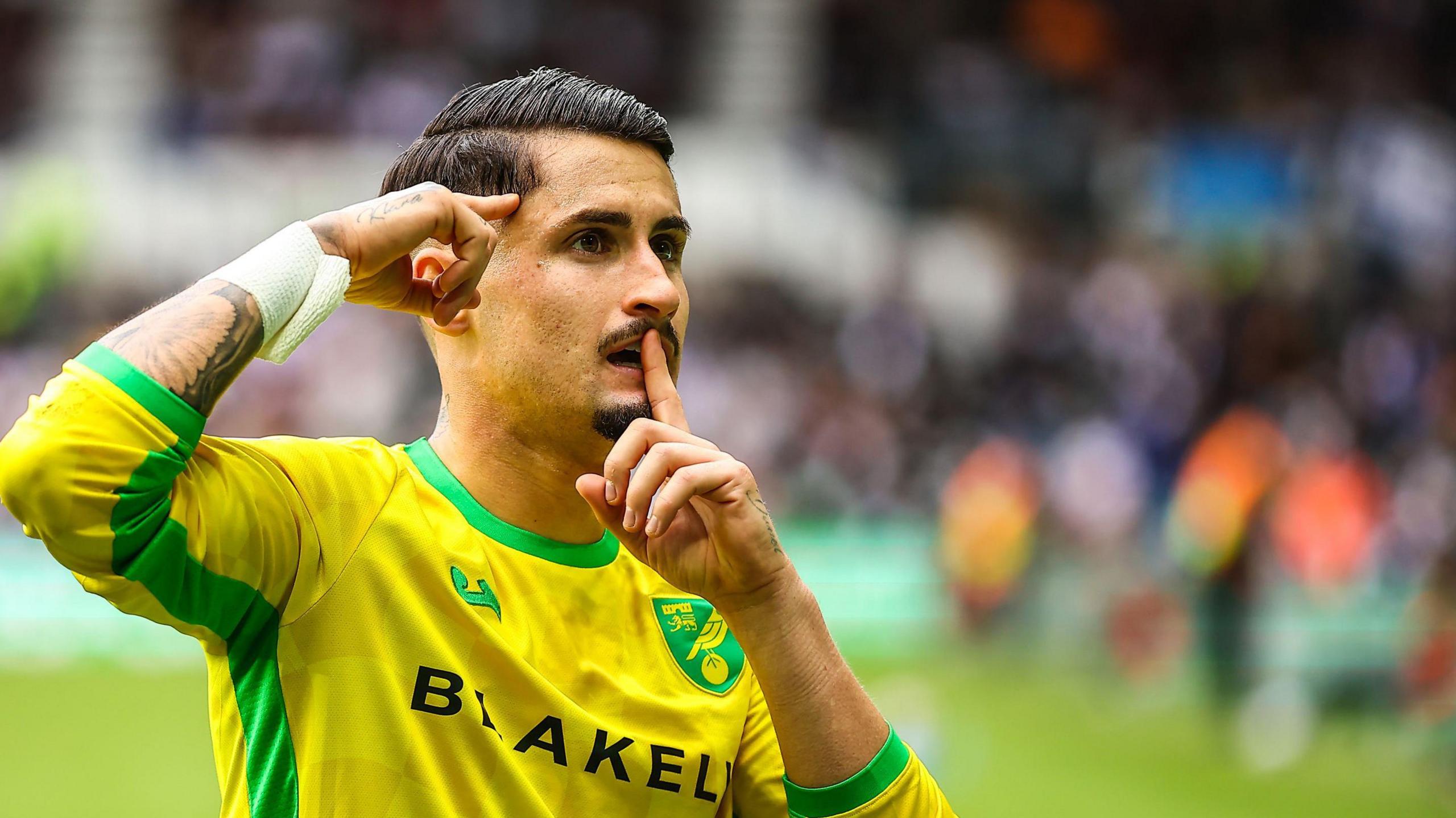 Borja Sainz puts his finger to his lips as he celebrates his goal for Norwich at Derby