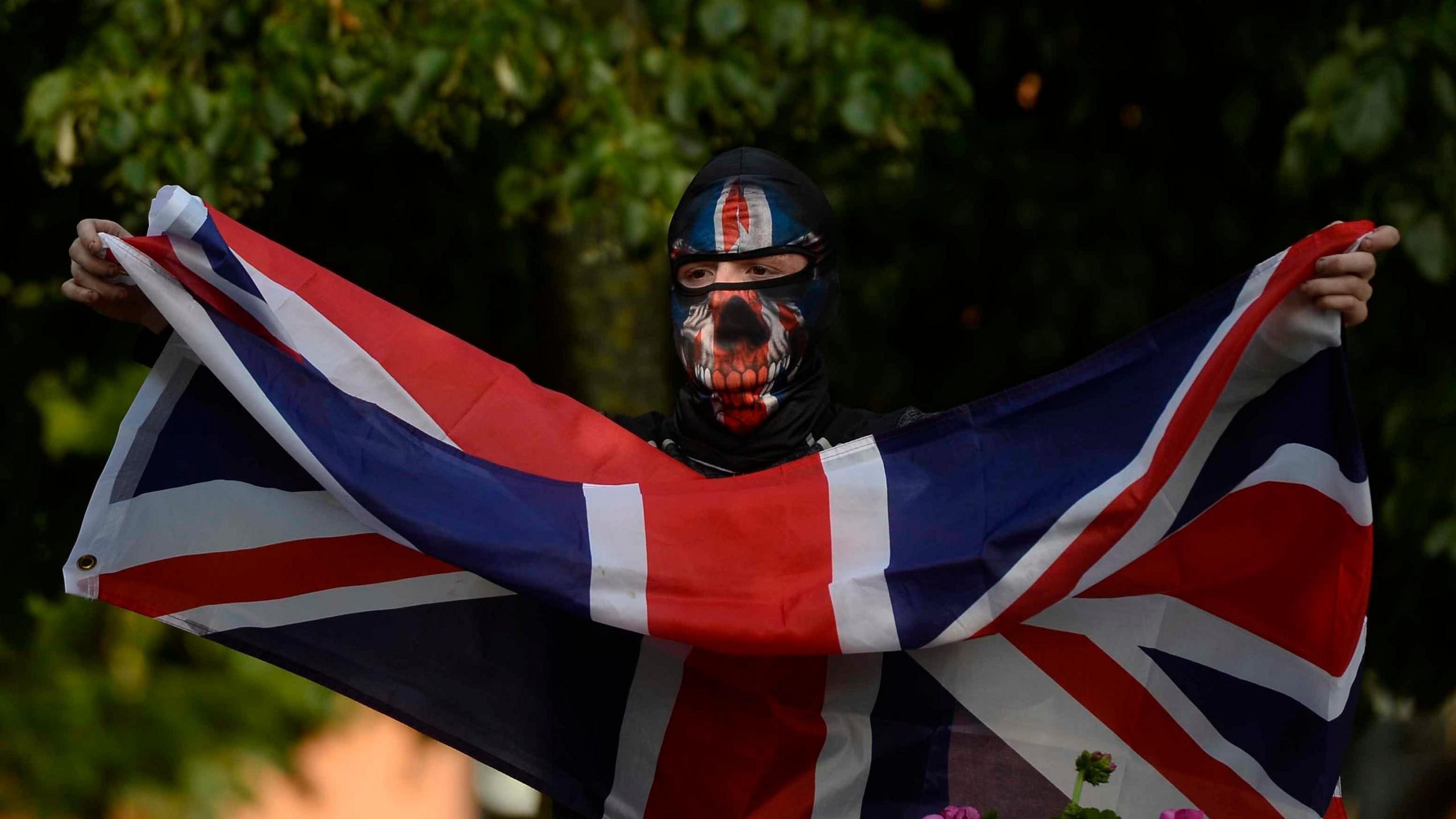 A man with a union jack and a balaclava 