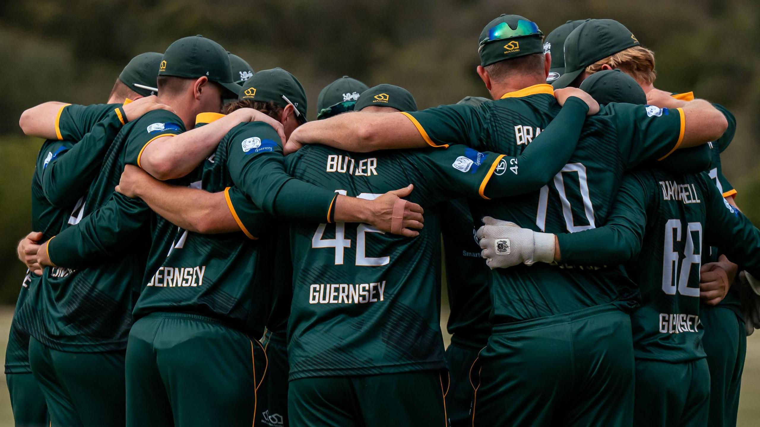 Guernsey team huddle