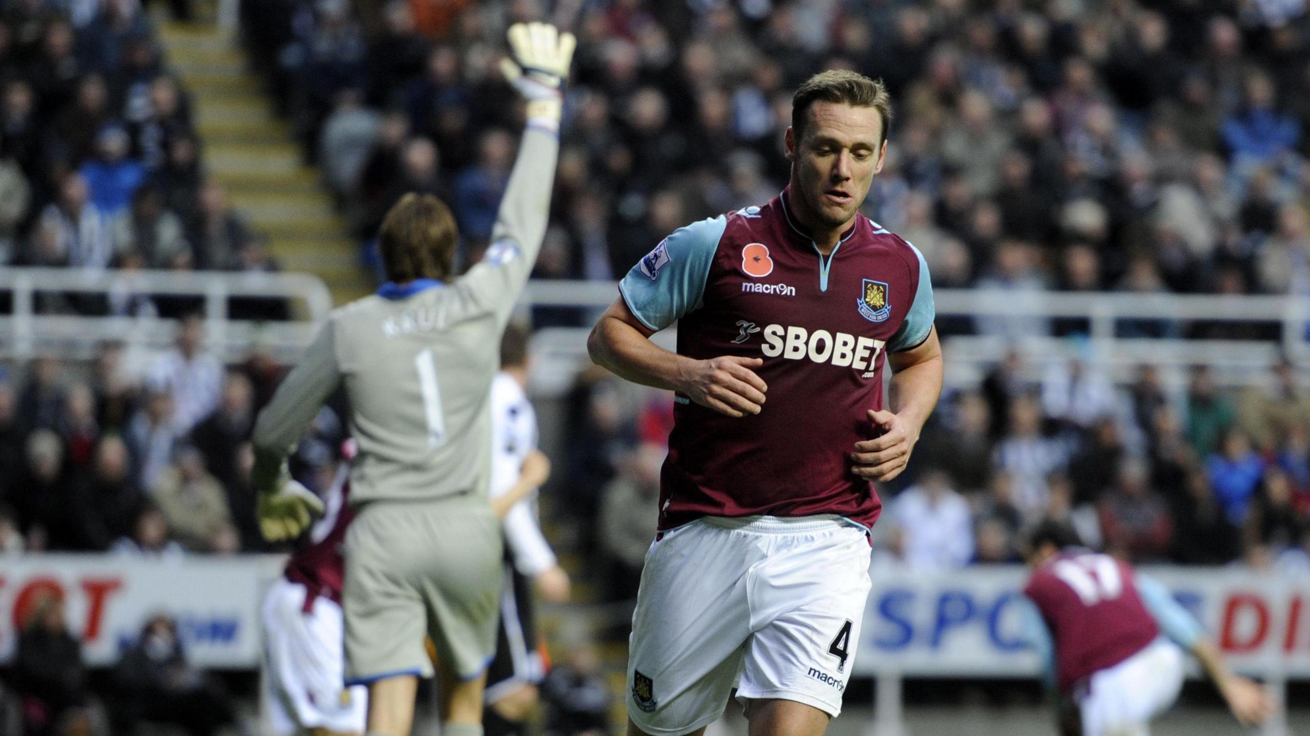 Kevin Nolan turns away after scoring for West Ham but does not celebrate as opponents Newcastle are his former club