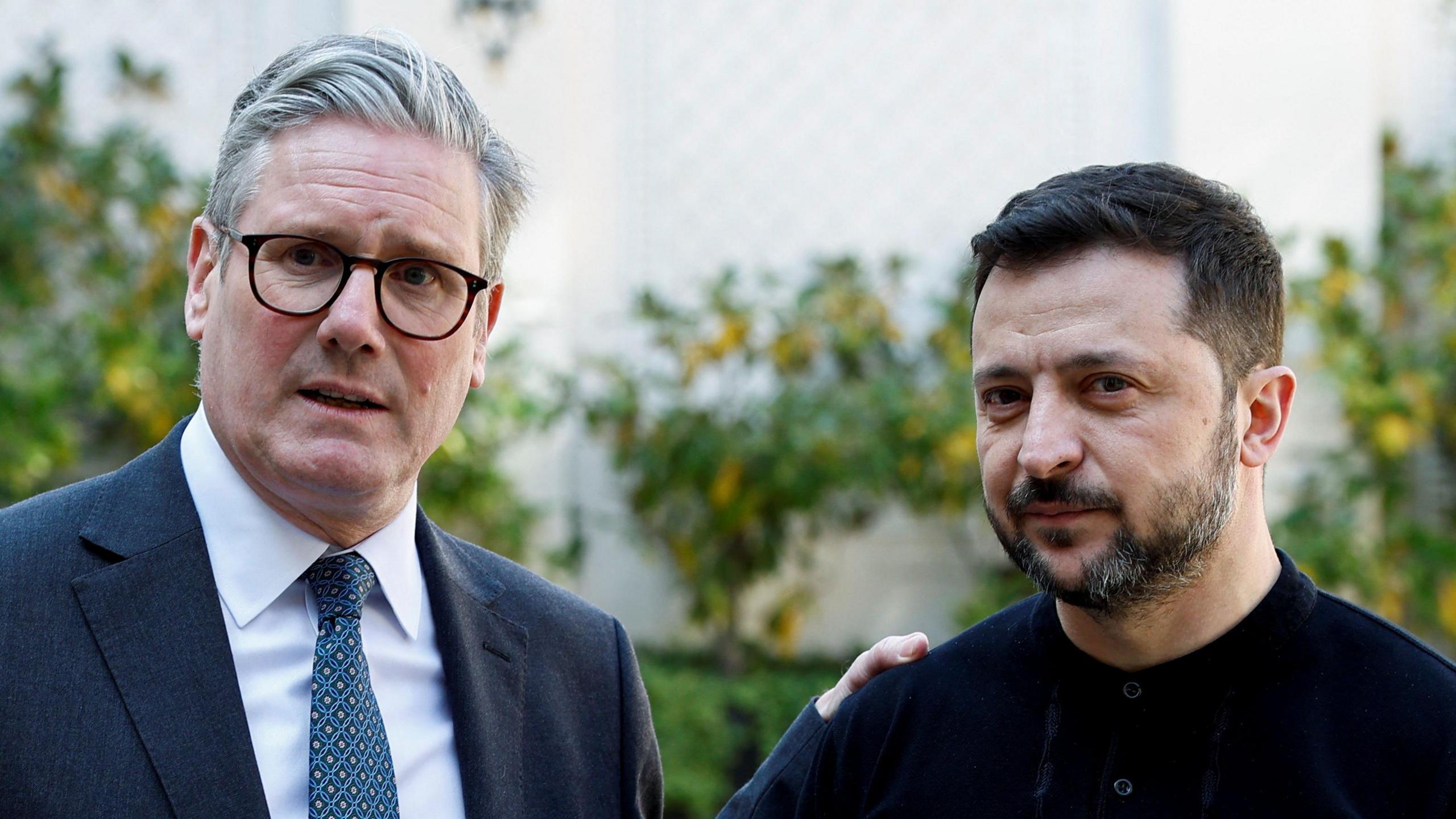 Prime Minister Sir Keir Starmer (left) and President of Ukraine Volodymyr Zelensky speak to the media at the UK Ambassador's Residence in Paris, after a meeting with European leaders to discuss peace and security for Ukraine.