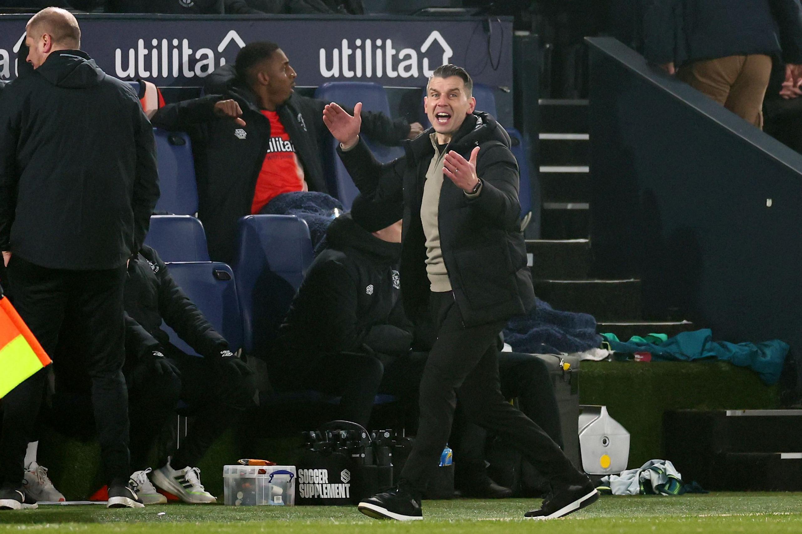 Luton Town boss Matt Bloomfield urges his side on from the touchline against Preston North End