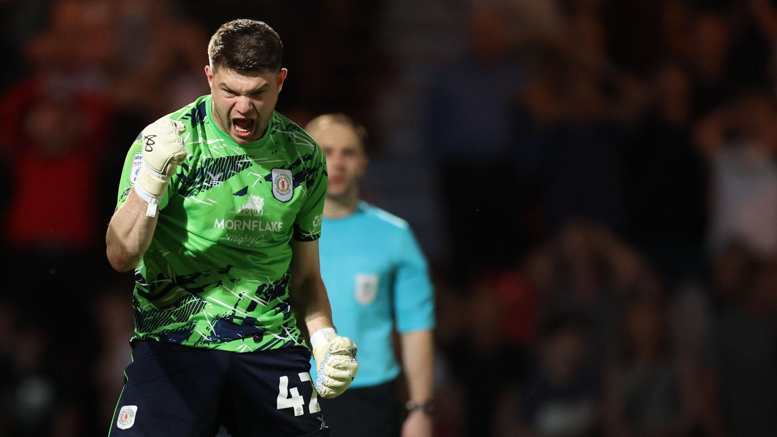 Max Stryjek celebrates for Crewe