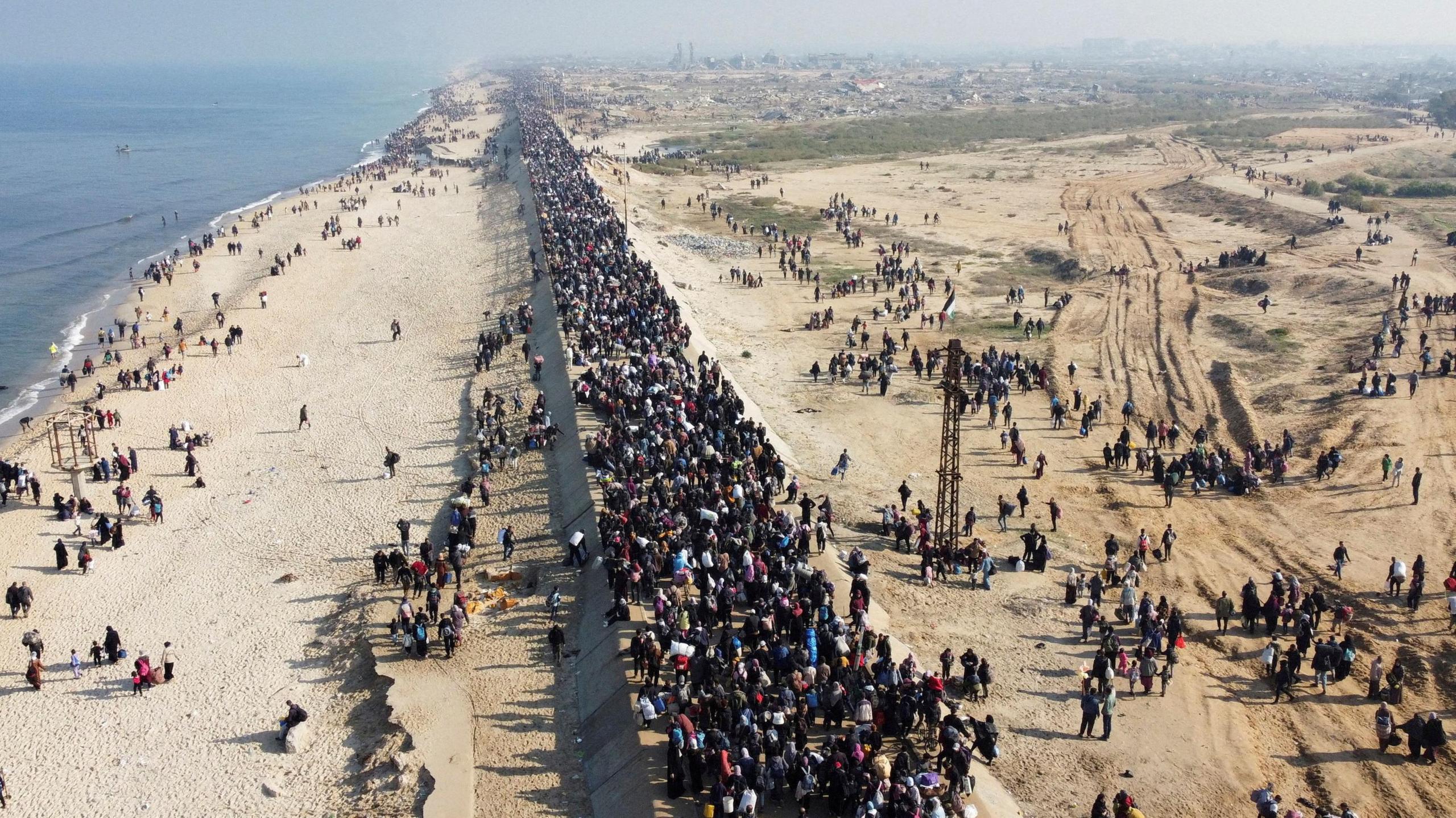 A drone view shows Palestinians, who were displaced to the south at Israel's order during the war, making their way back to their homes in northern Gaza, amid a ceasefire between Israel and Hamas, in the central Gaza Strip, January 27, 2025.