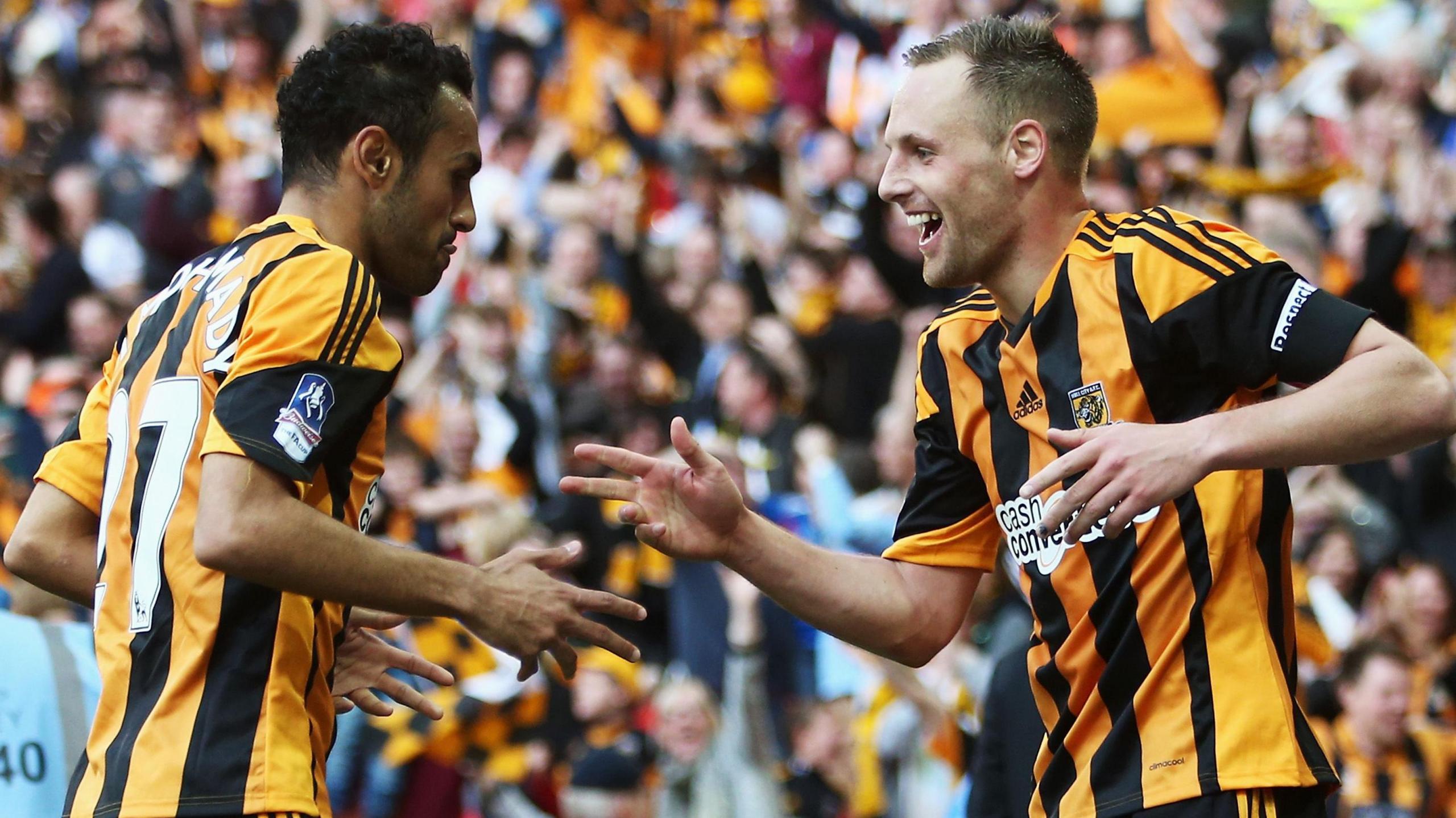 David Meyler of Hull City celebrates with team mate Ahmed Elmohamady