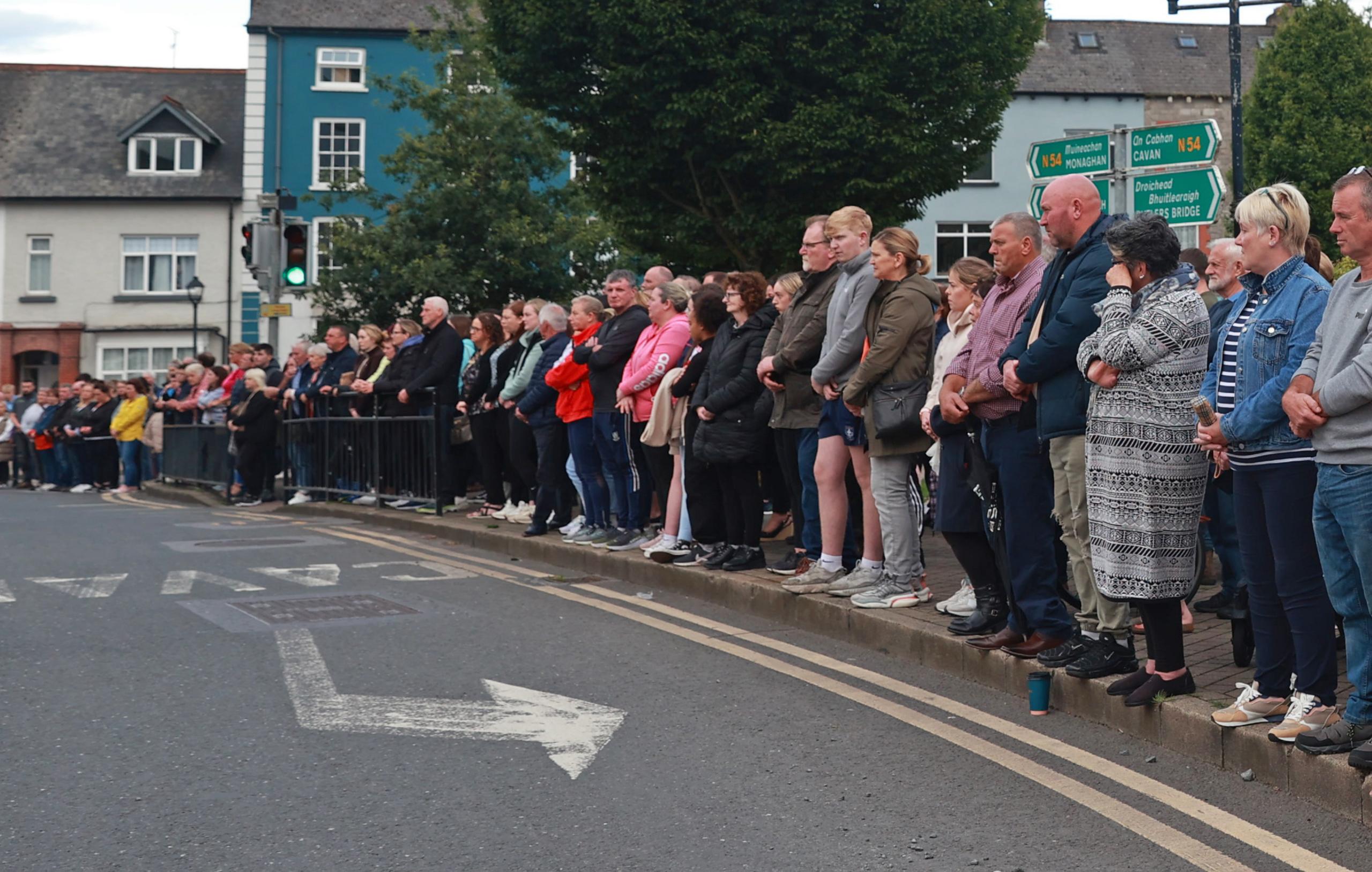 People awaited the hearse carrying Dlava Mohamed's remains on Thursday evening