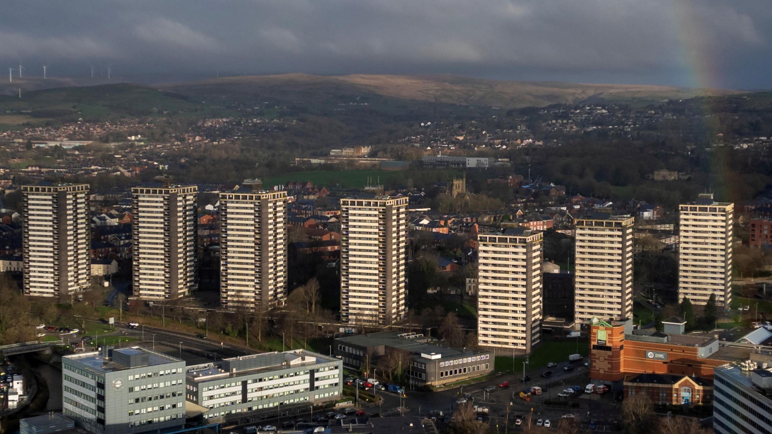 A drone view of a rainbow behind the seven sisters residential tower blocks in Rocdhale. 