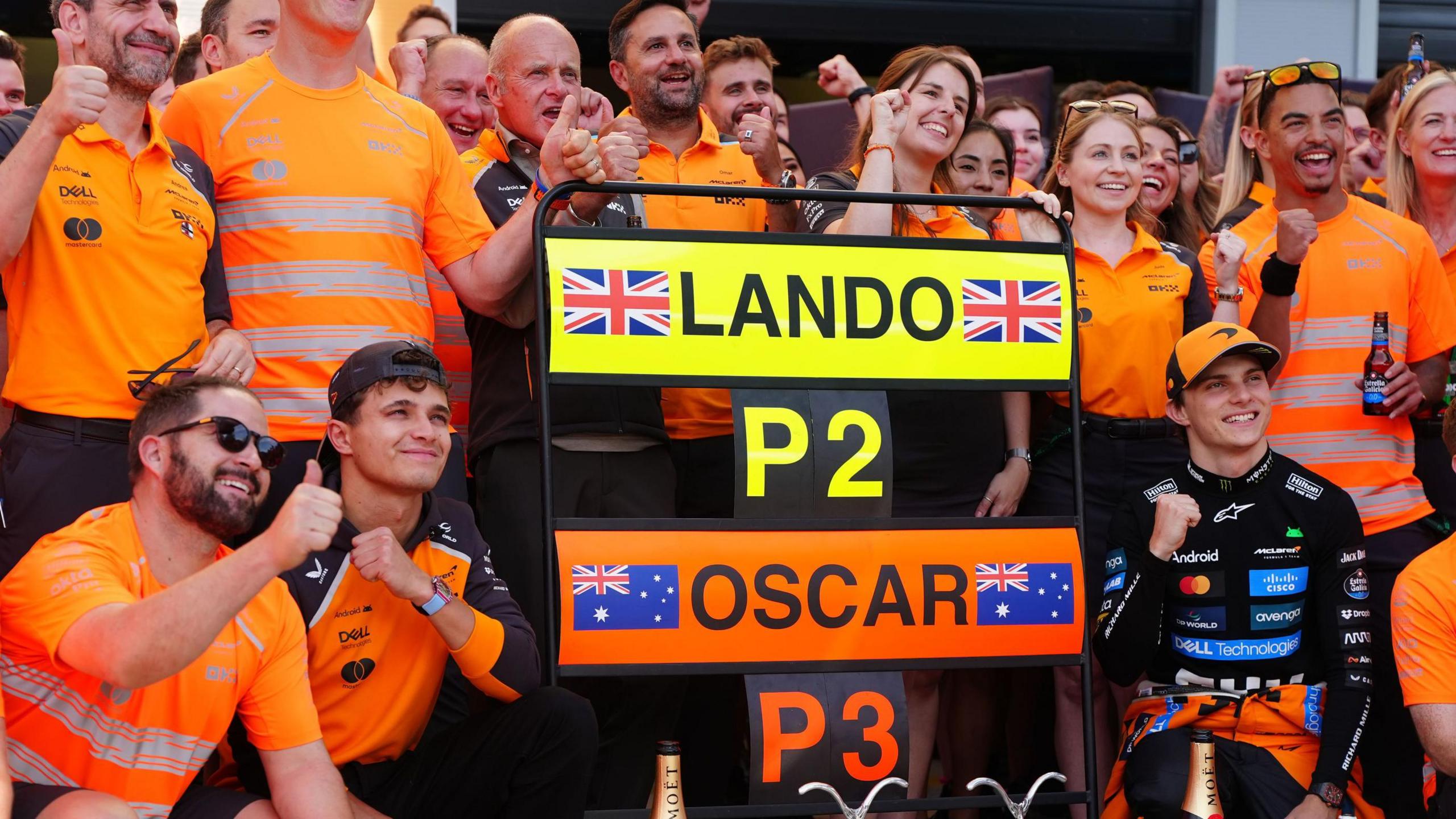 McLaren celebrating Lando Norris and Oscar Piastri after finishing second and third and the Italian Grand Prix