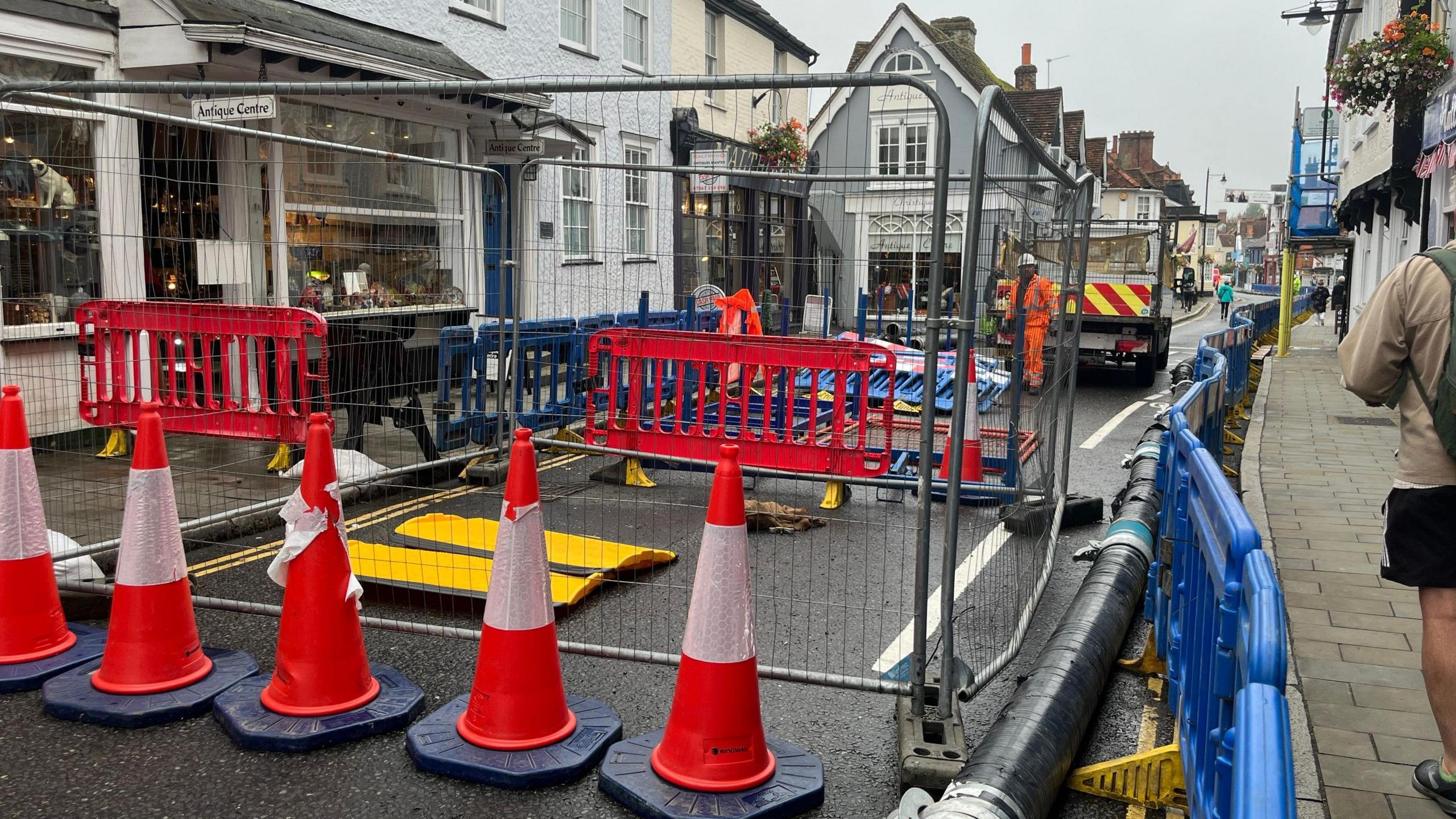 Barriers around the sinkhole on West Street