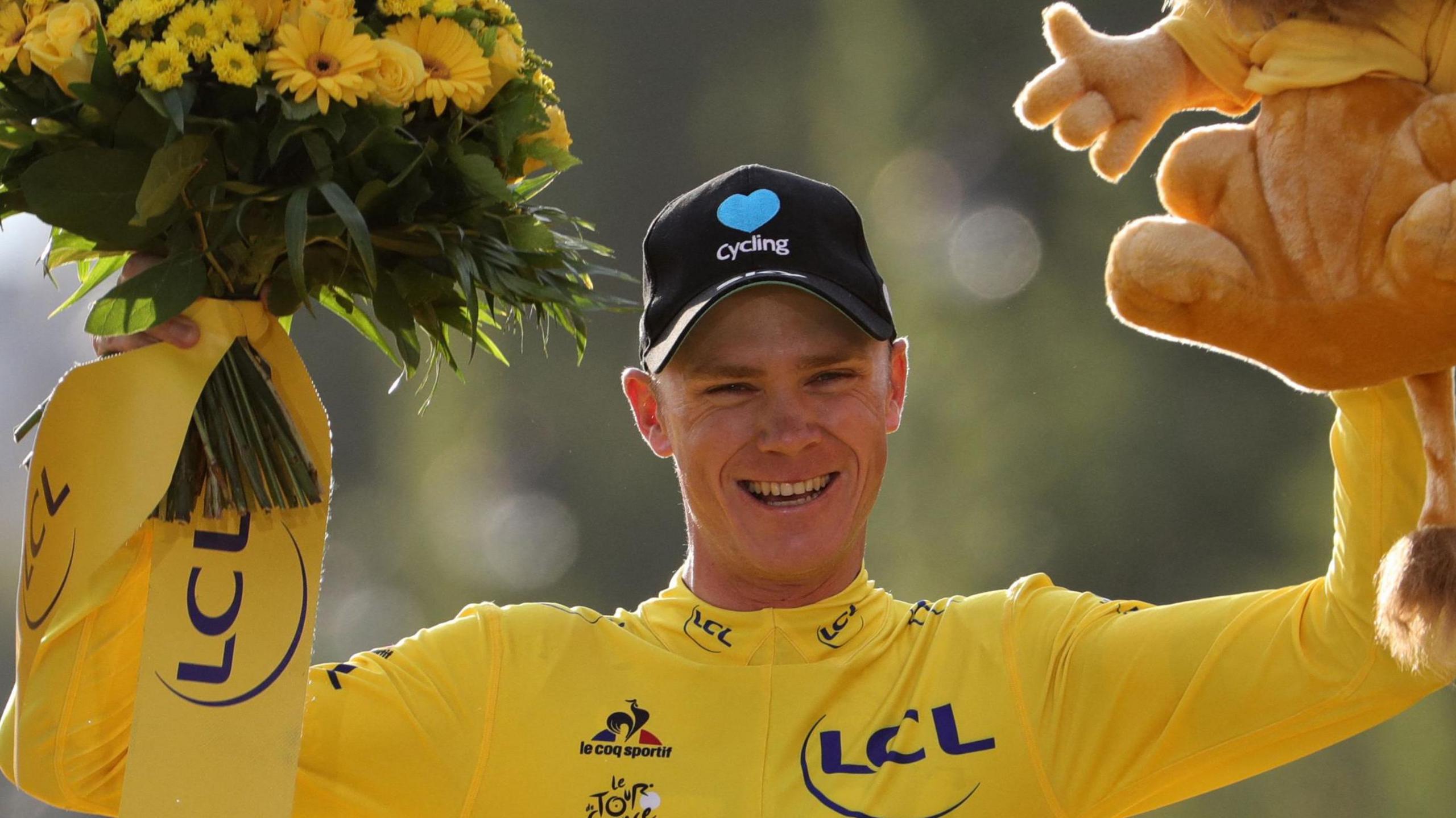 Chris Froome celebrating at the Tour de France